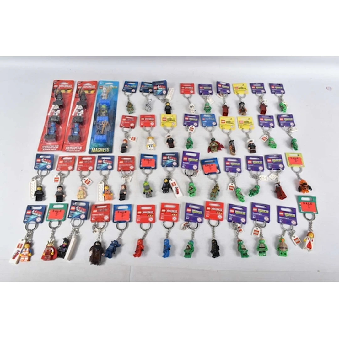 APPROXIMATELY FORTY-THREE LEGO KEYRINGS AND THREE TRIPLE MAG...