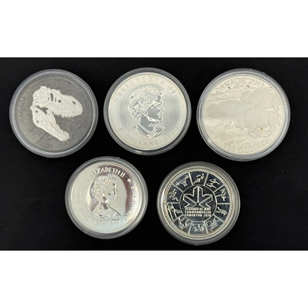 A group of five Canadian silver coins, comprising 1977 and 1...