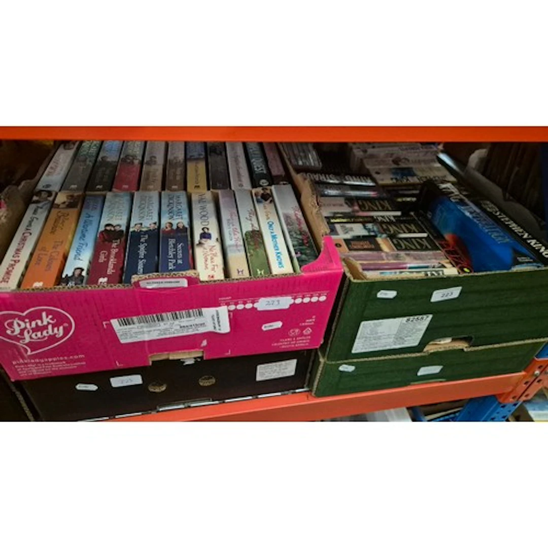 4 boxes of books to include a box of Stephen King novels