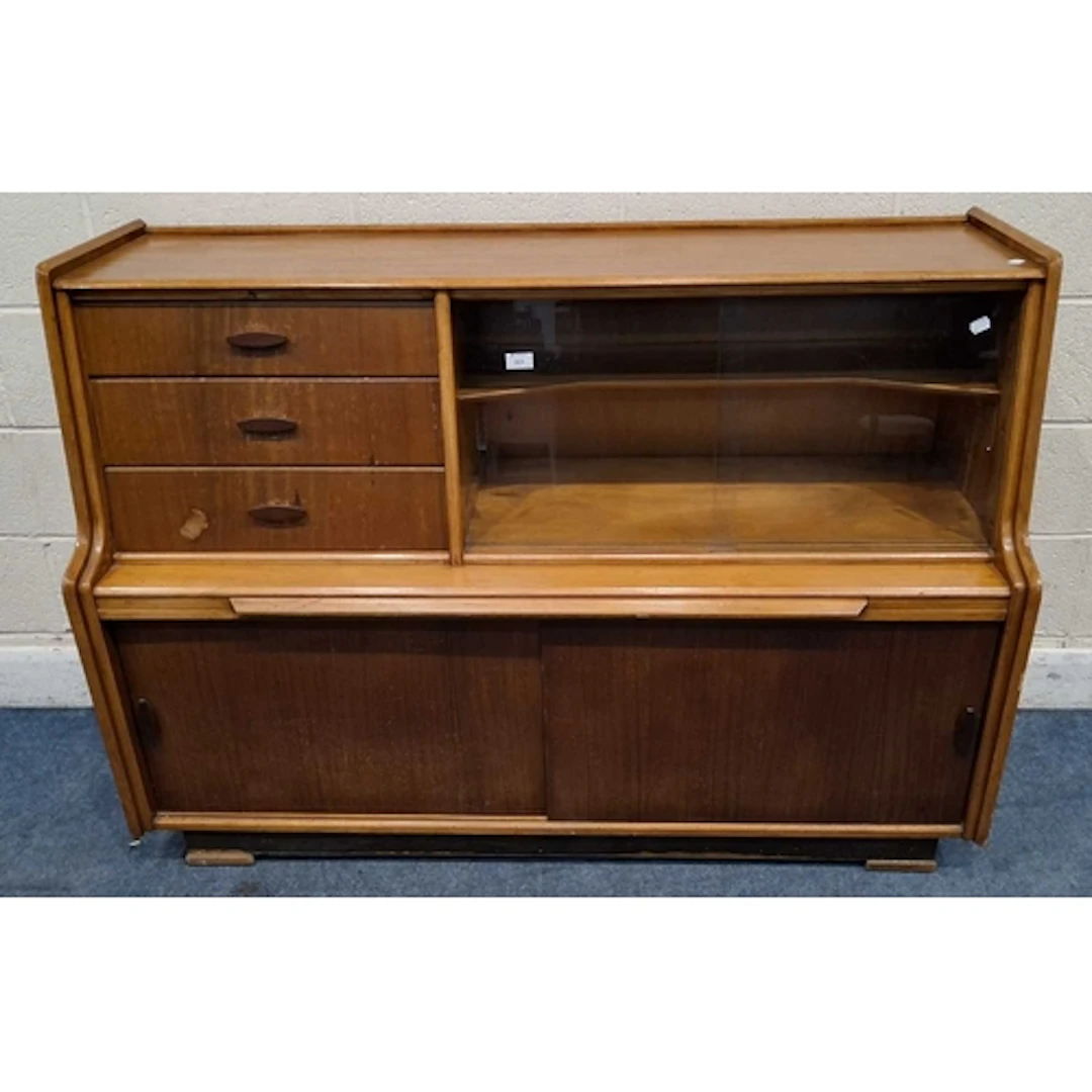 A MID-CENTURY TEAK SIDEBOARD, fitted with three drawers, dou...