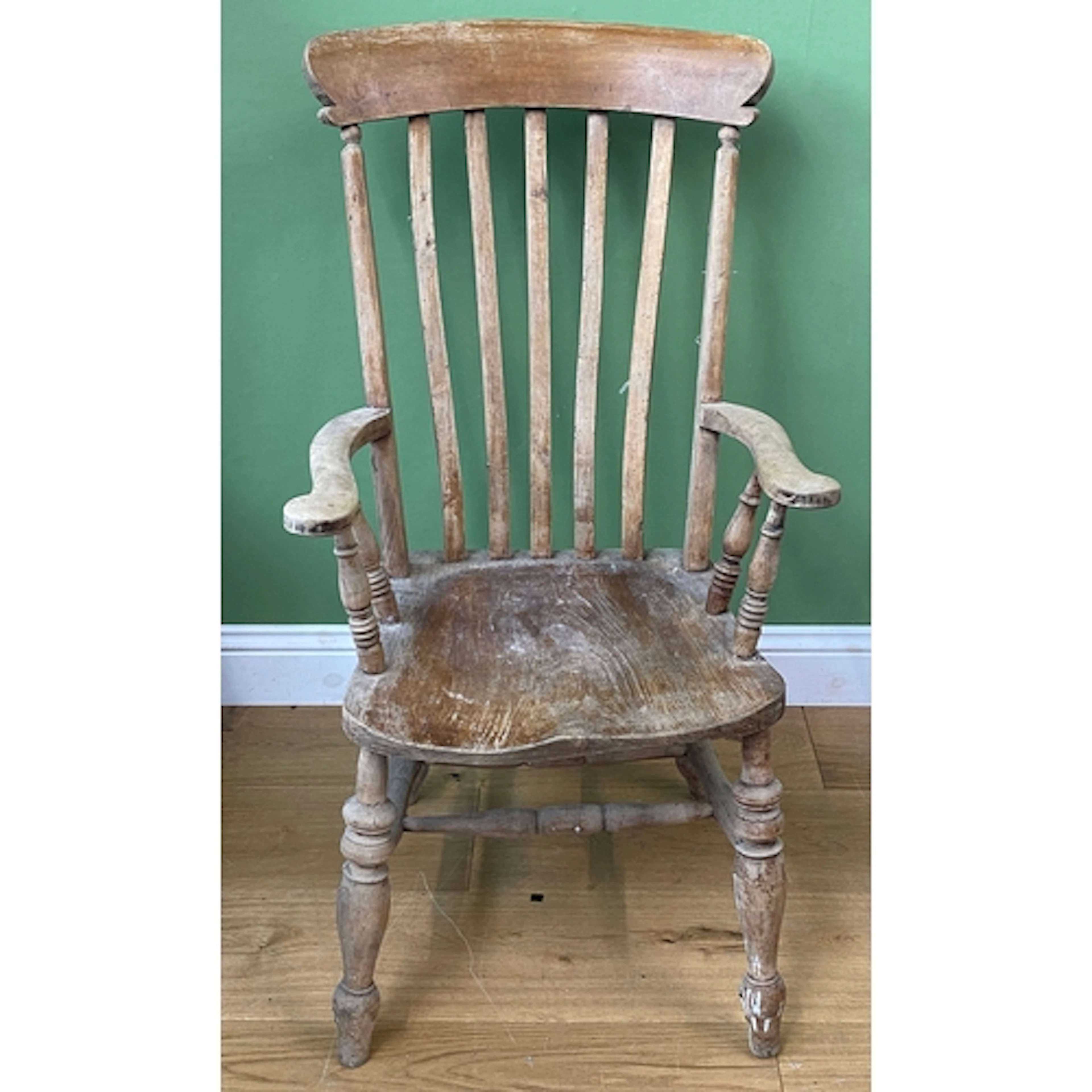 A latheback Windsor open armchair