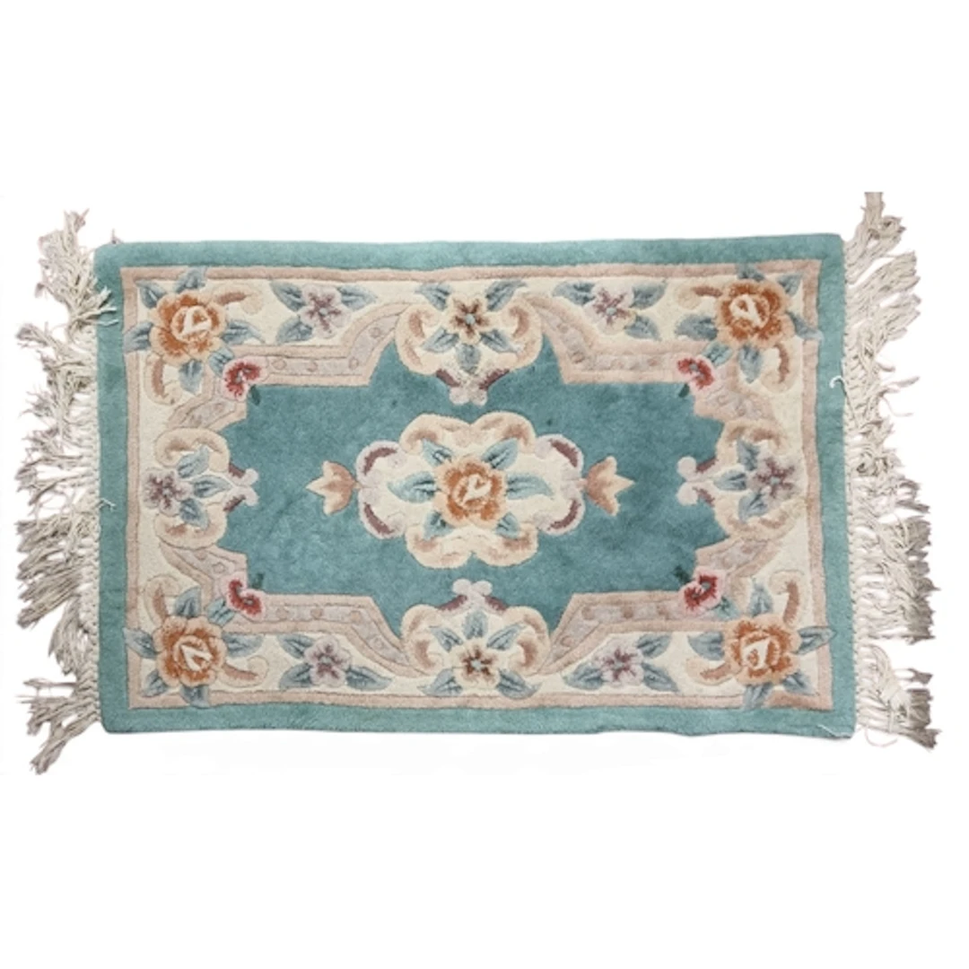 Two Oriental Rugs. 110 x 60 cm approx.