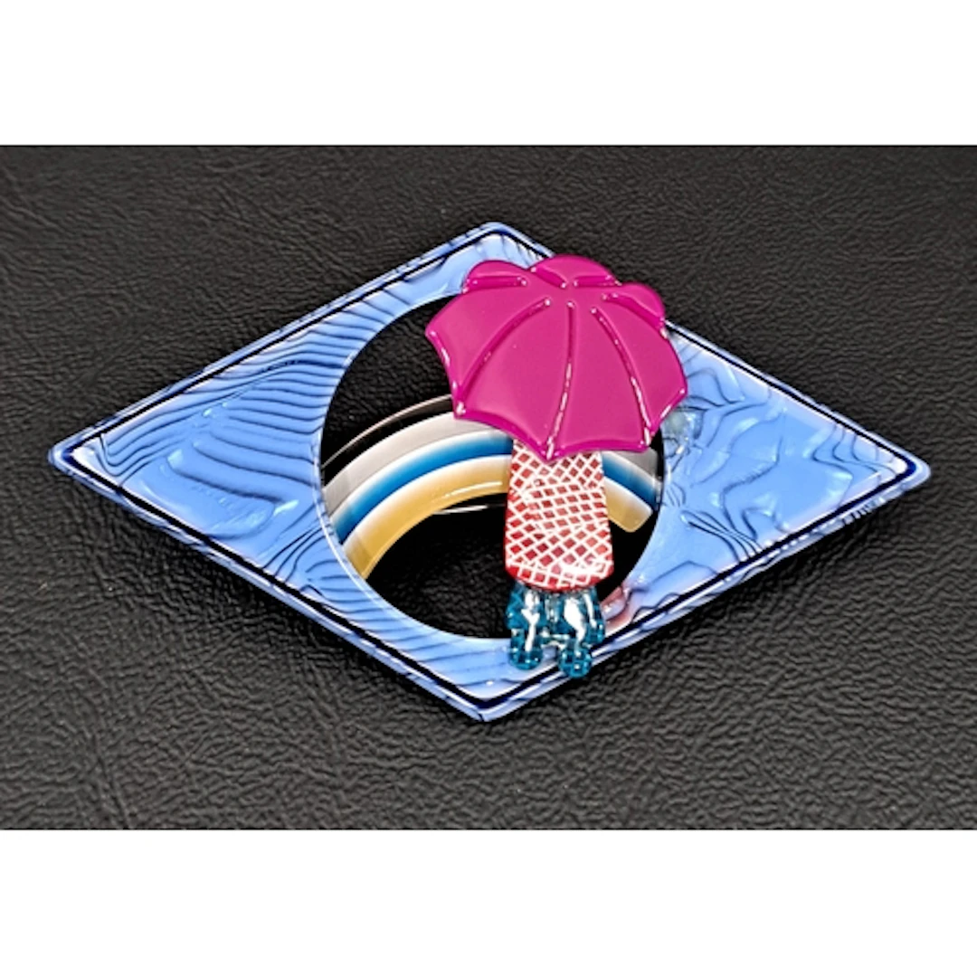 LEA STEIN UMBRELLA GIRL AND RAINBOW BROOCH with figure with ...