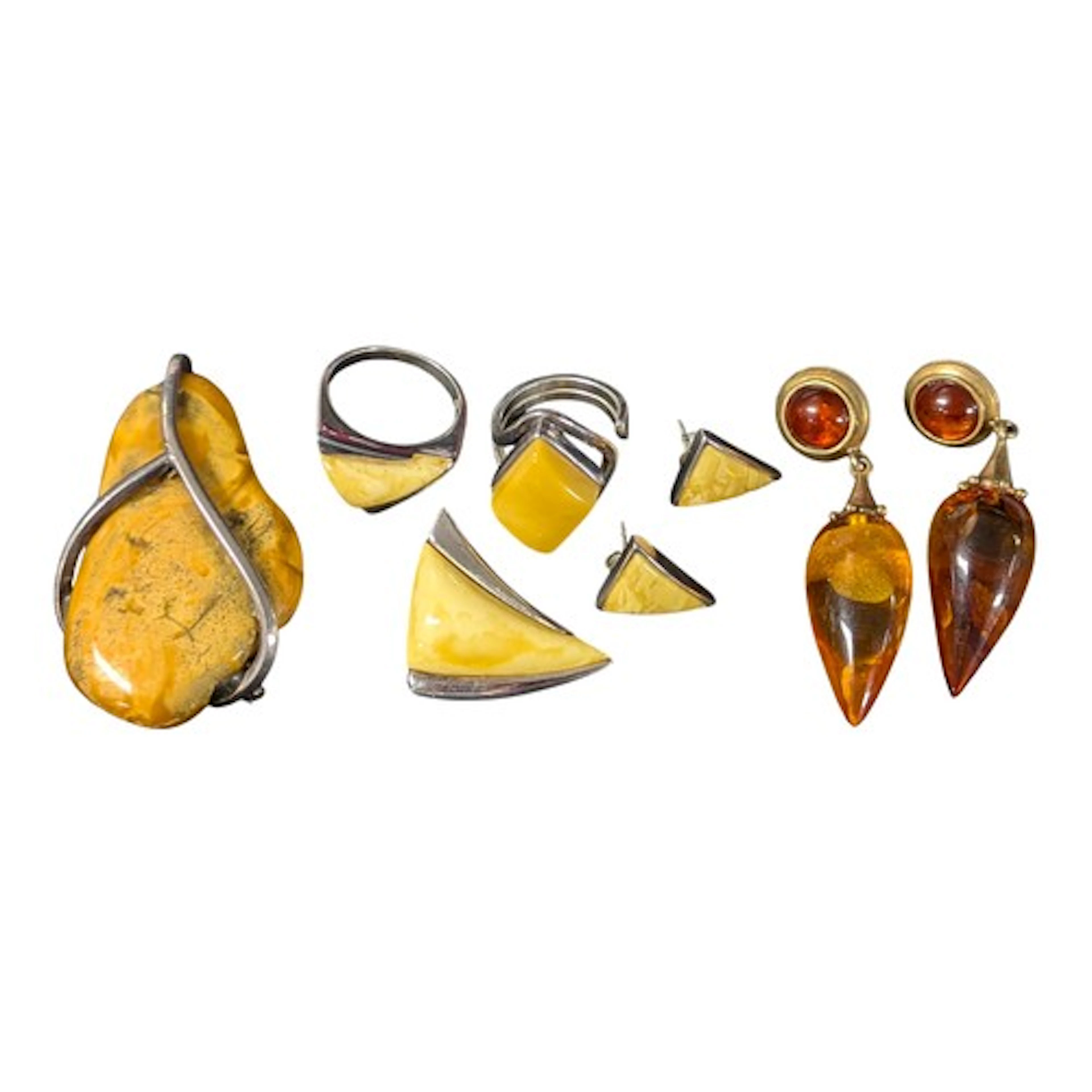 Jewellery - a pair of silver mounted amber tubular drop earr...