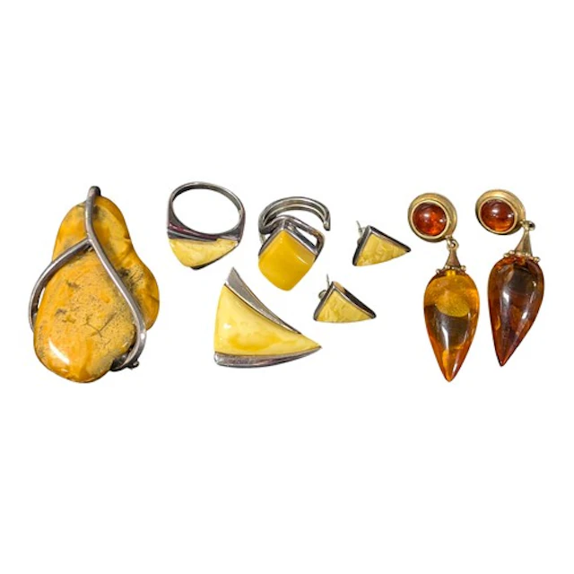 Jewellery - a pair of silver mounted amber tubular drop earr...