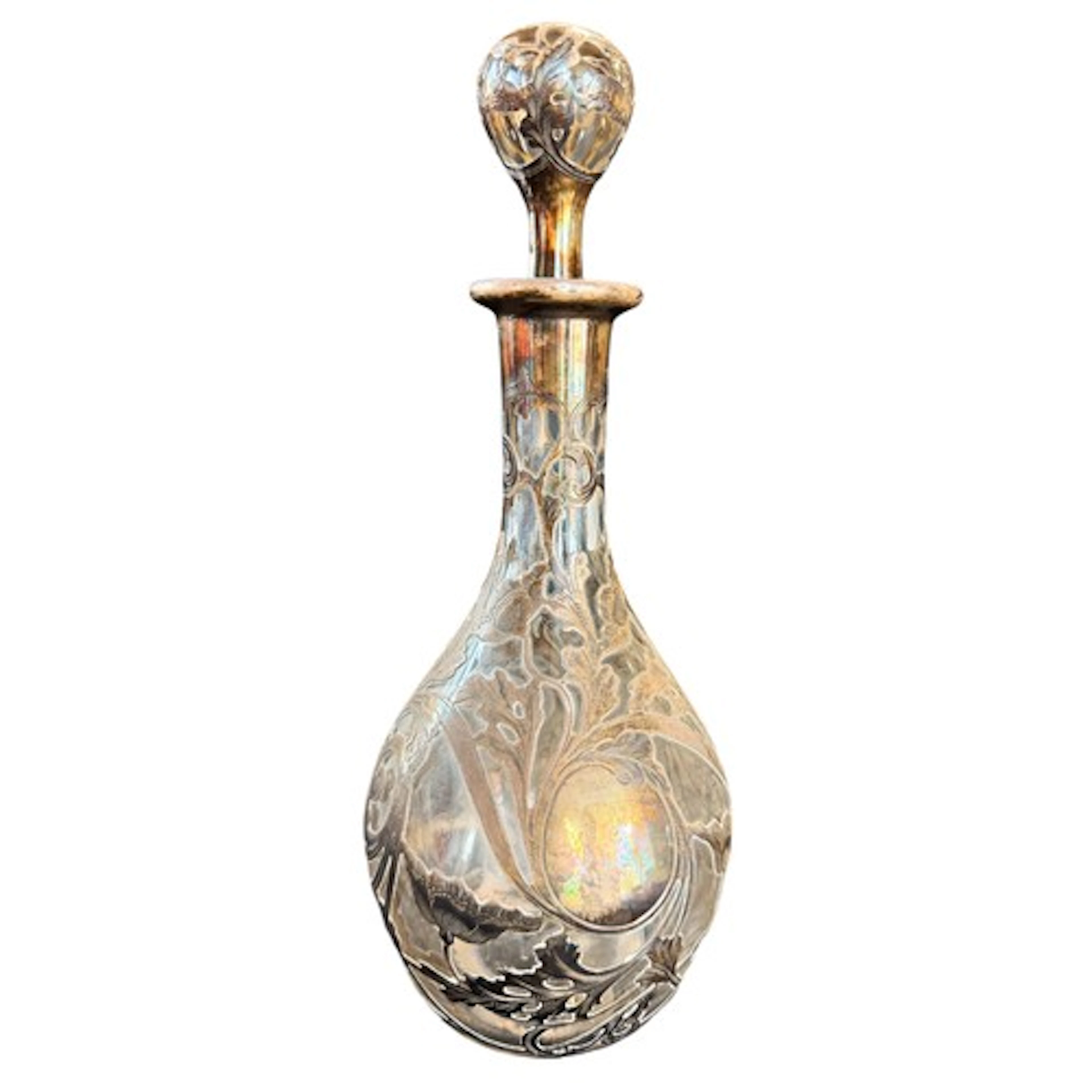 A 20th century white metal mounted clear glass decanter, sta...