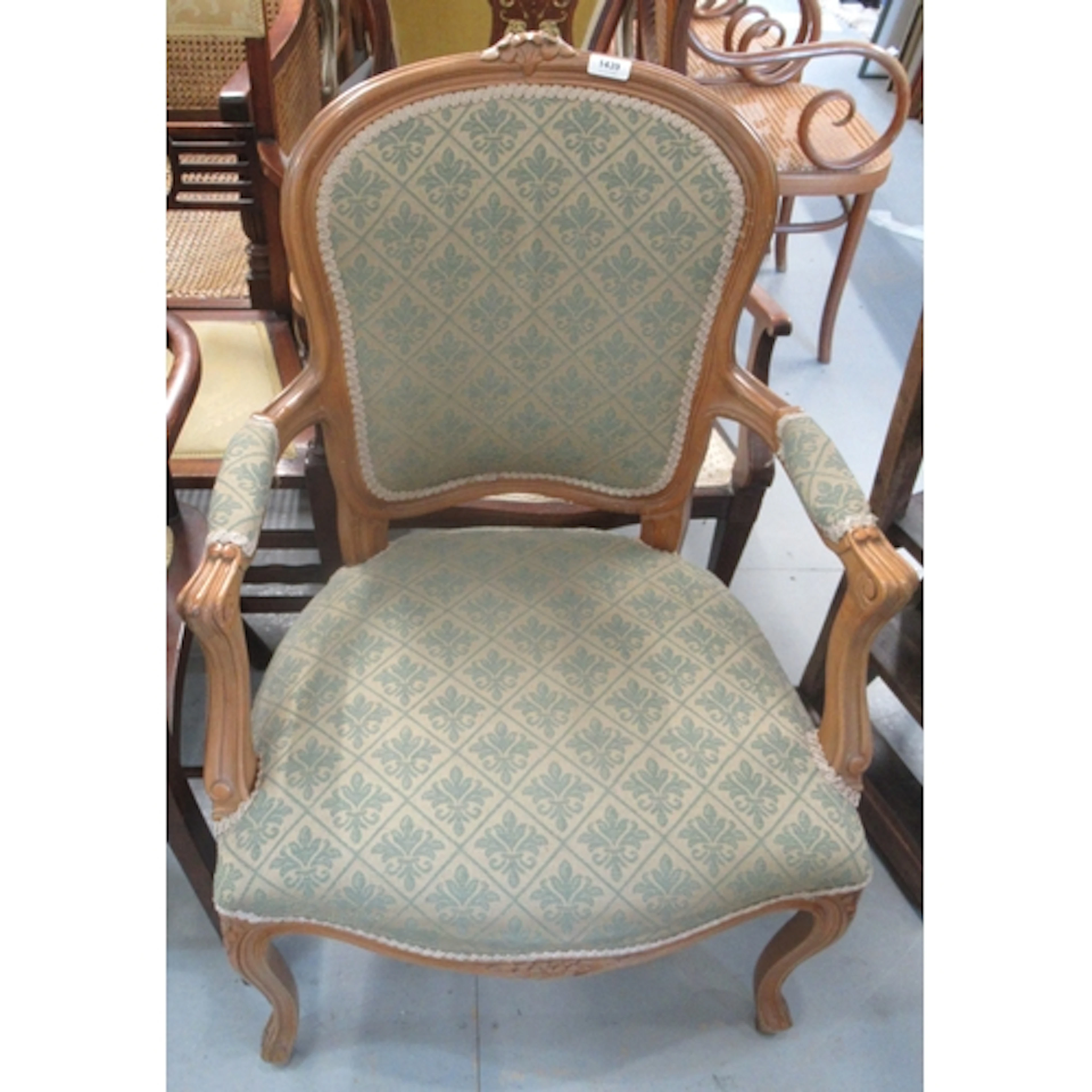 20th Century French beechwood open elbow chair, with green /...