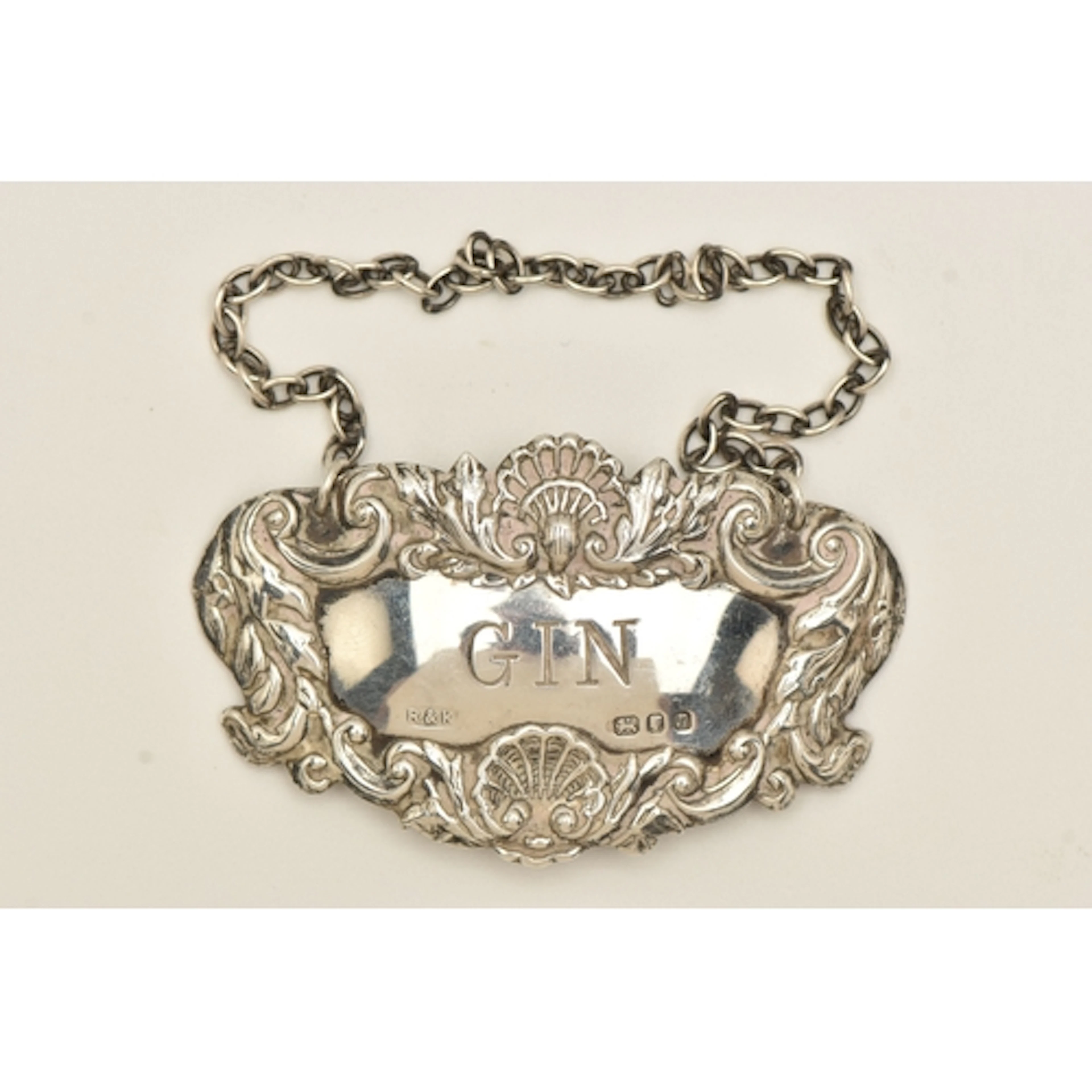 AN ELIZABETH II SILVER 'GIN' DECANTER LABEL, hallmarked 'Ric...