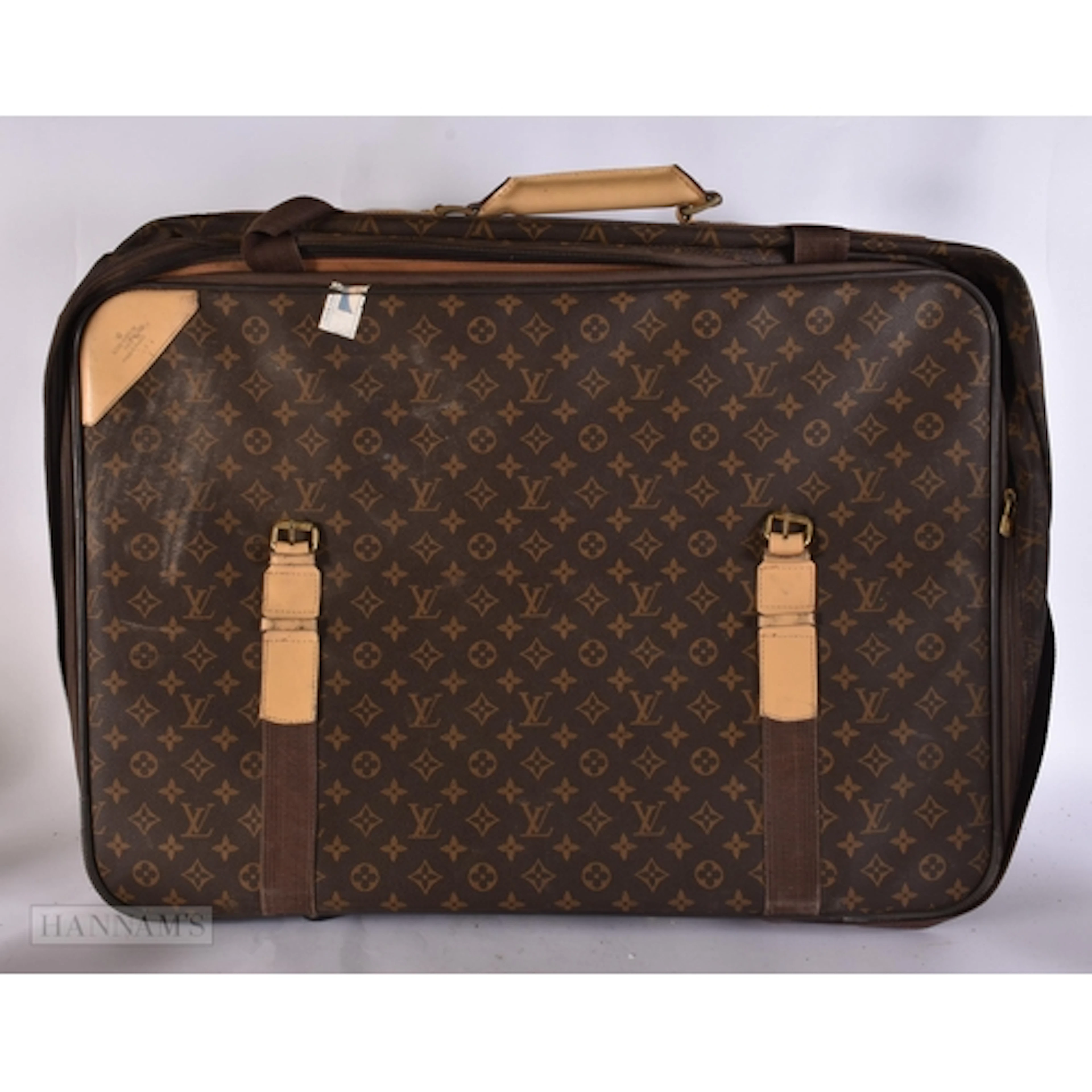A VINTAGE LEATHER SUITCASE. 70 cm x 44 cm.