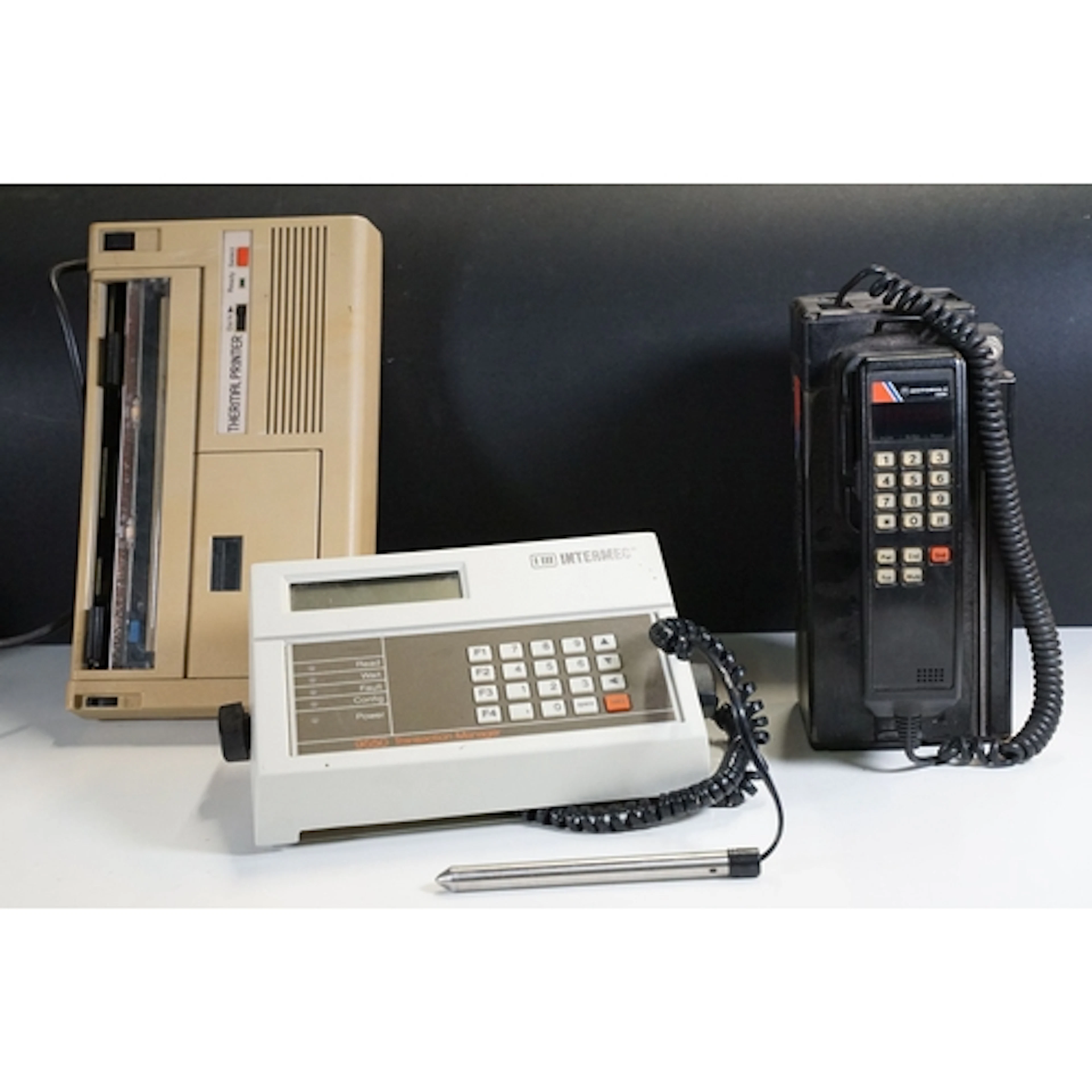 Motorola 4500X portable telephone together with an Okimate 2...