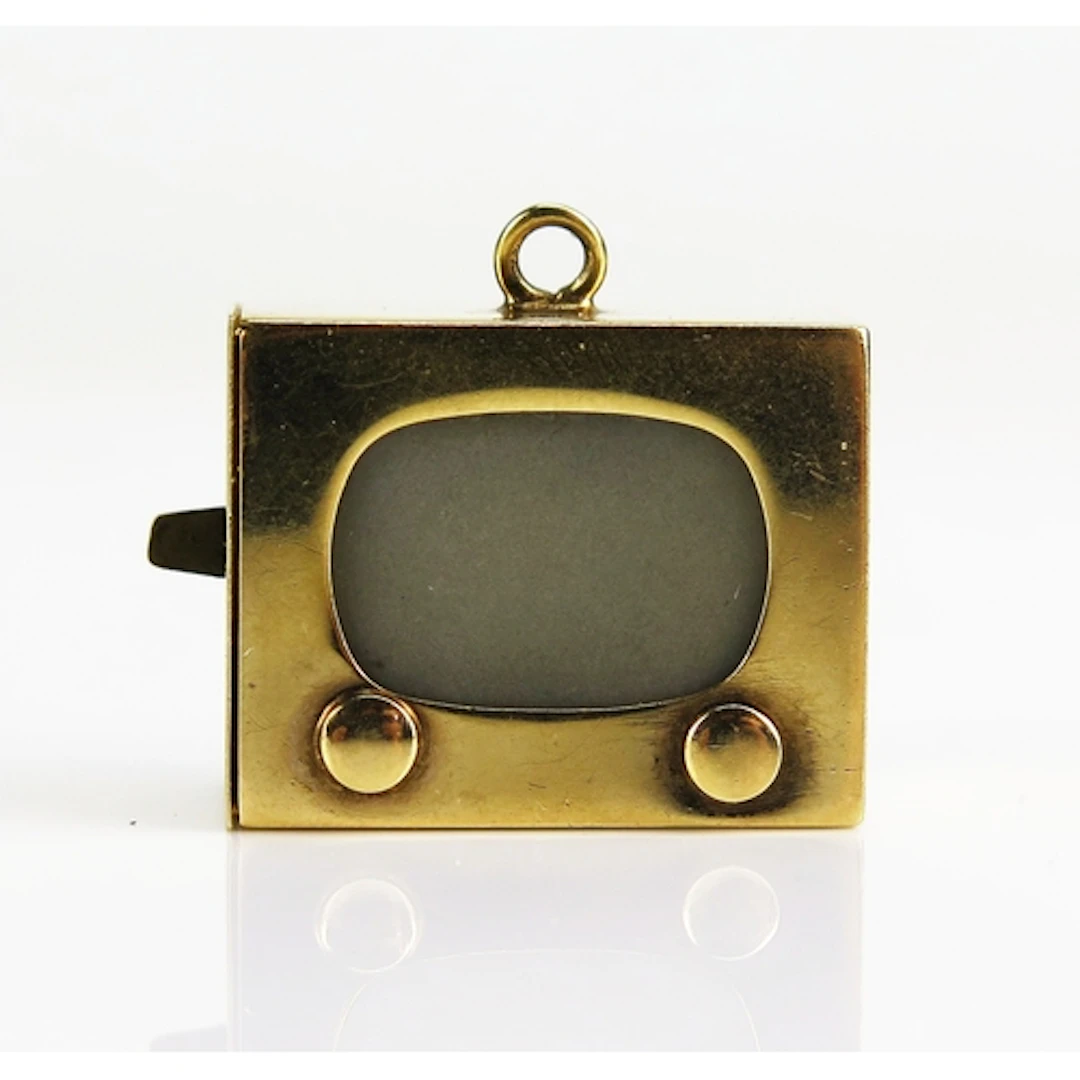 A 'BLUE DANUBE' 9ct gold musical TV charm, London 1960, 16.1...