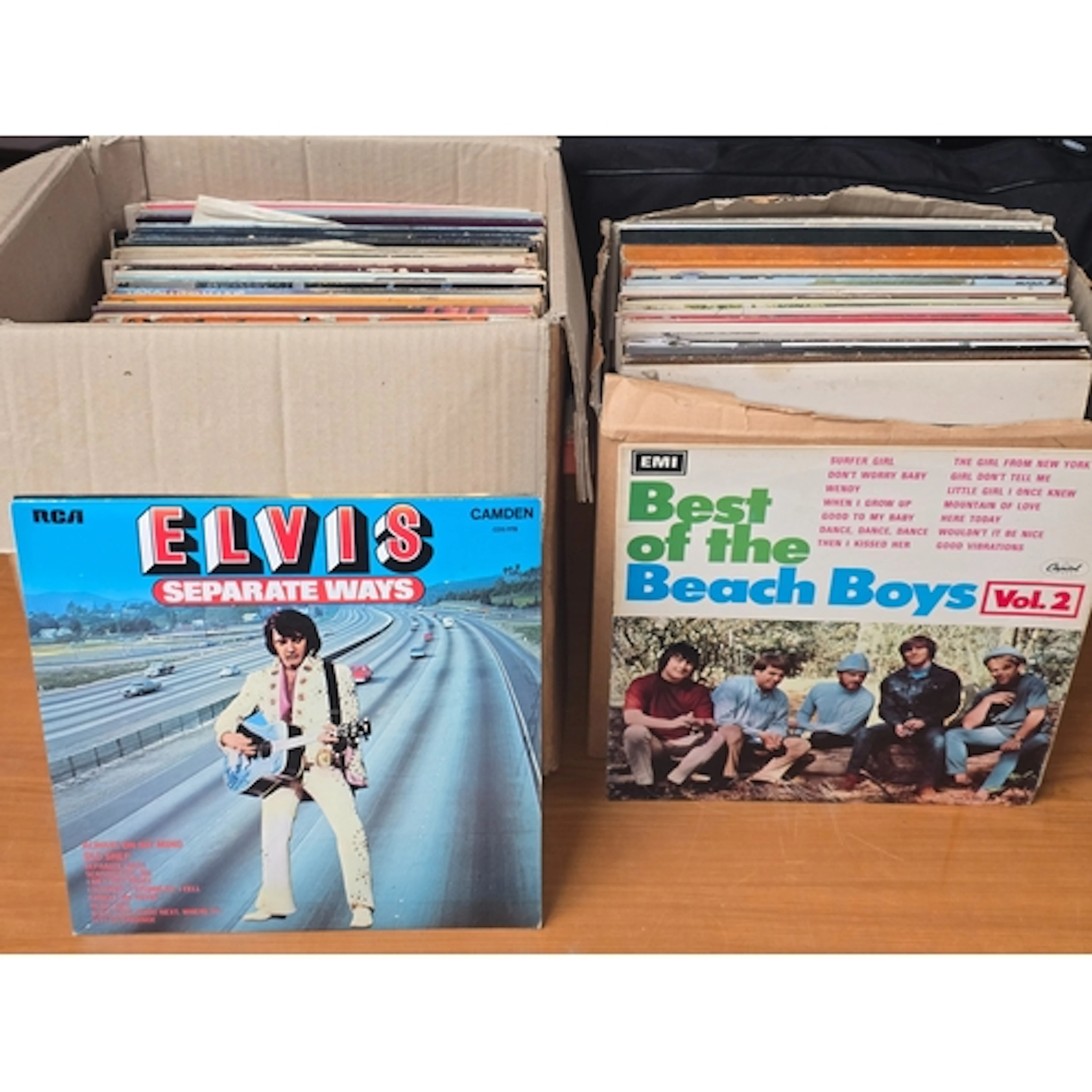 Two boxes of Pop/Rock/Jazz LP records.