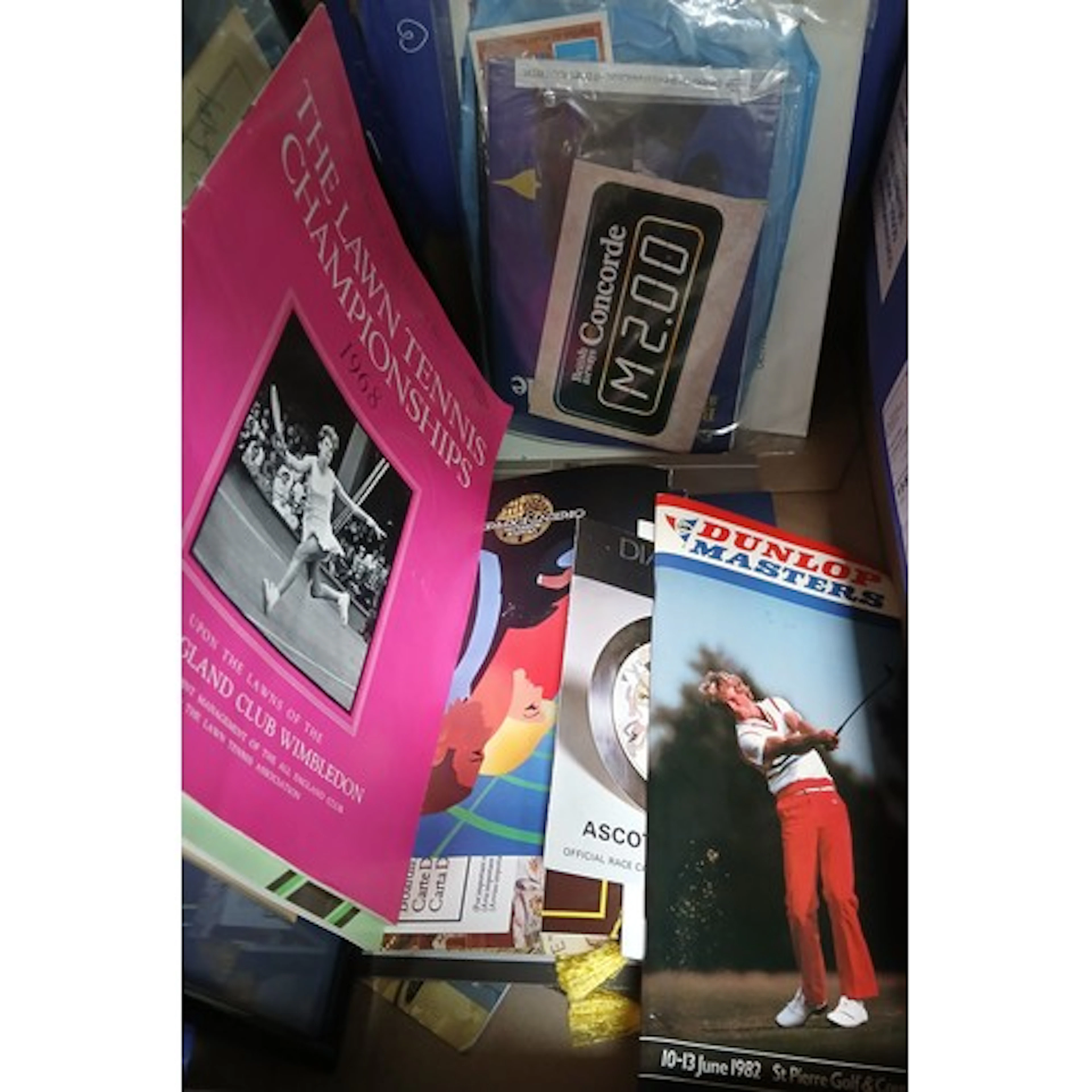 A box of assorted sporting memorabilia including a frame Lan...