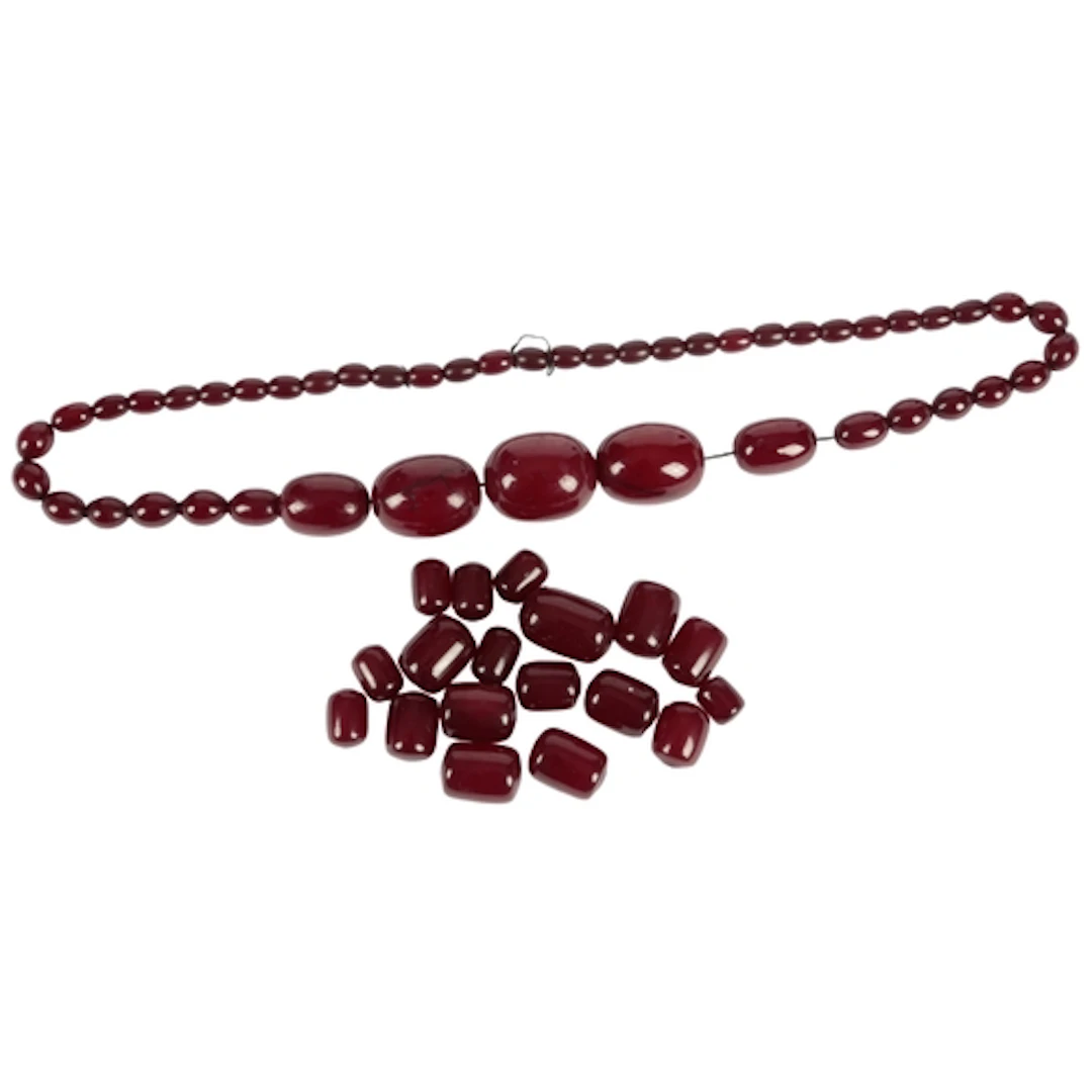 Simulated cherry amber beads (necklace and loose beads)...