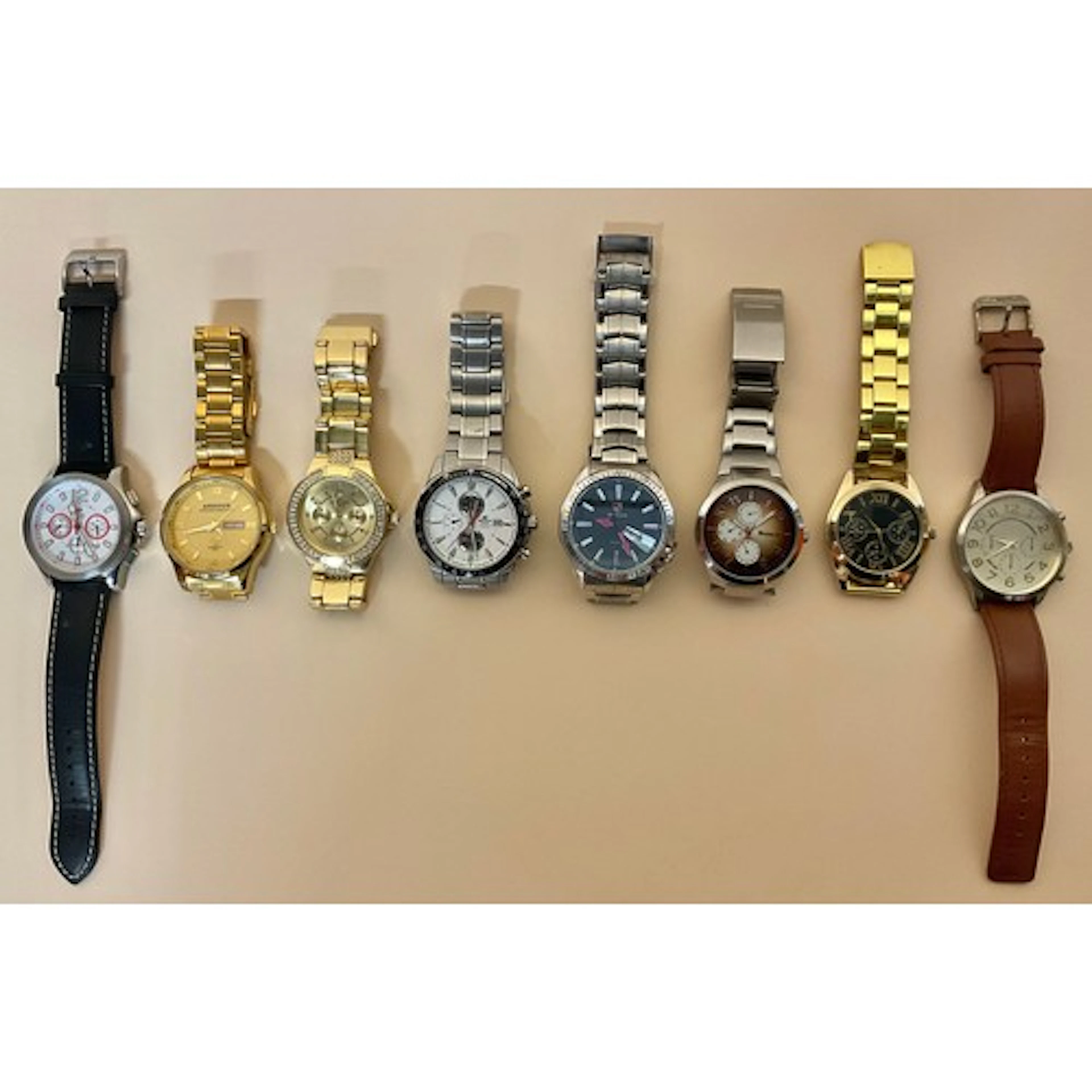 Watches - An accumulation of eight multi dialled and day-dat...