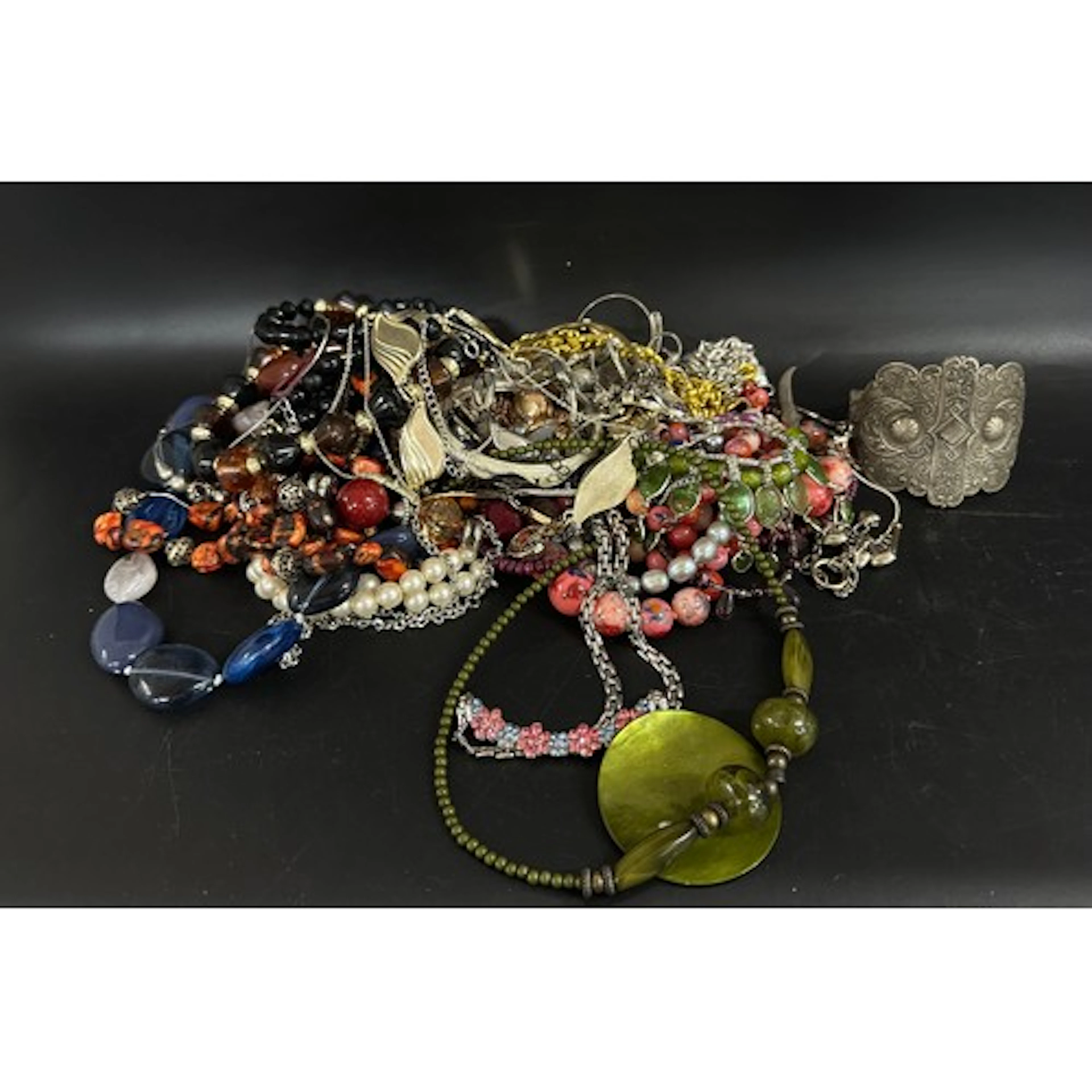 Costume jewellery to include a Swarovski bangle and designer...