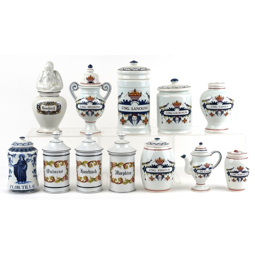 A collection of OUD Delft porcelain apothecary jars and cove...