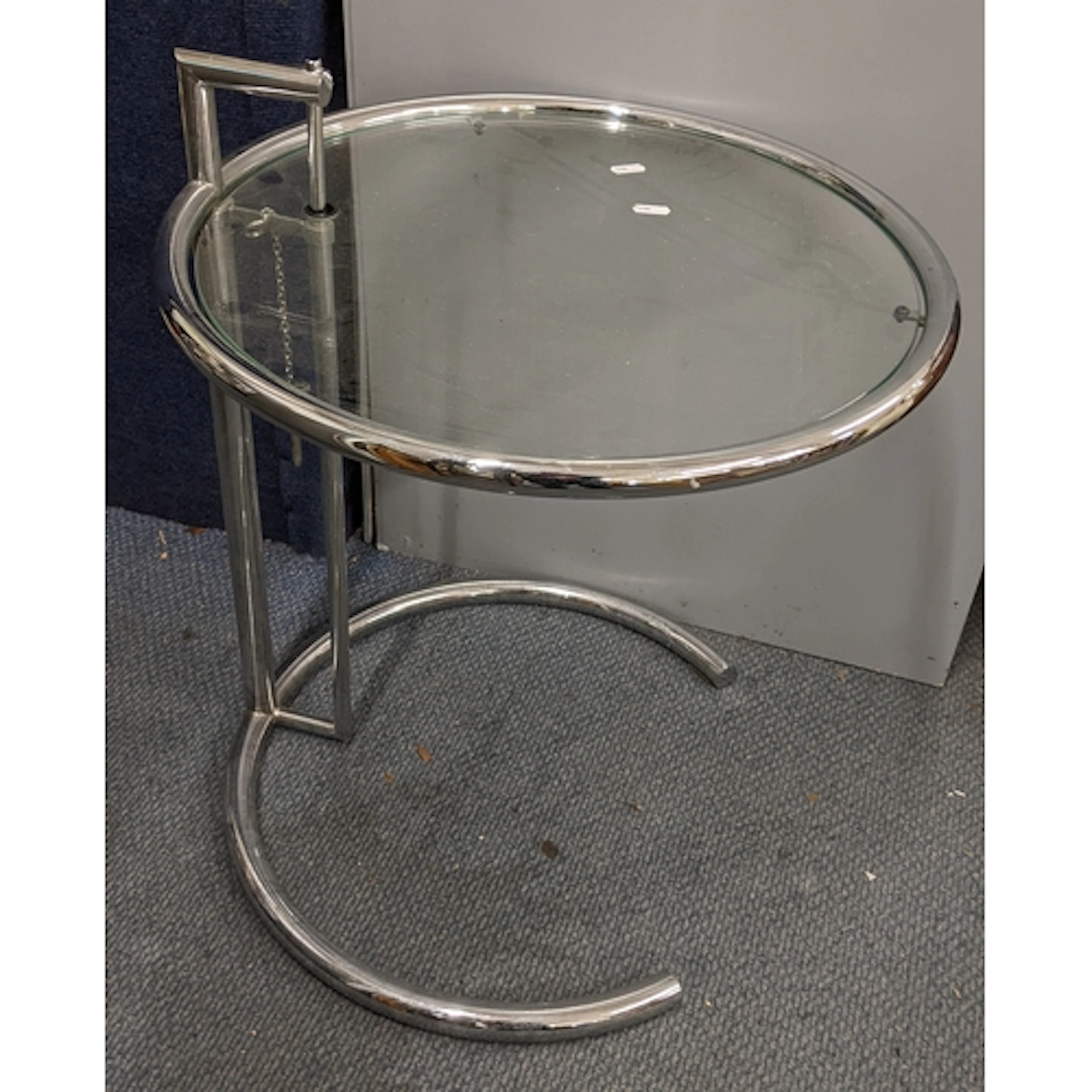 A contemporary classical style Eileen Gray occasional table ...