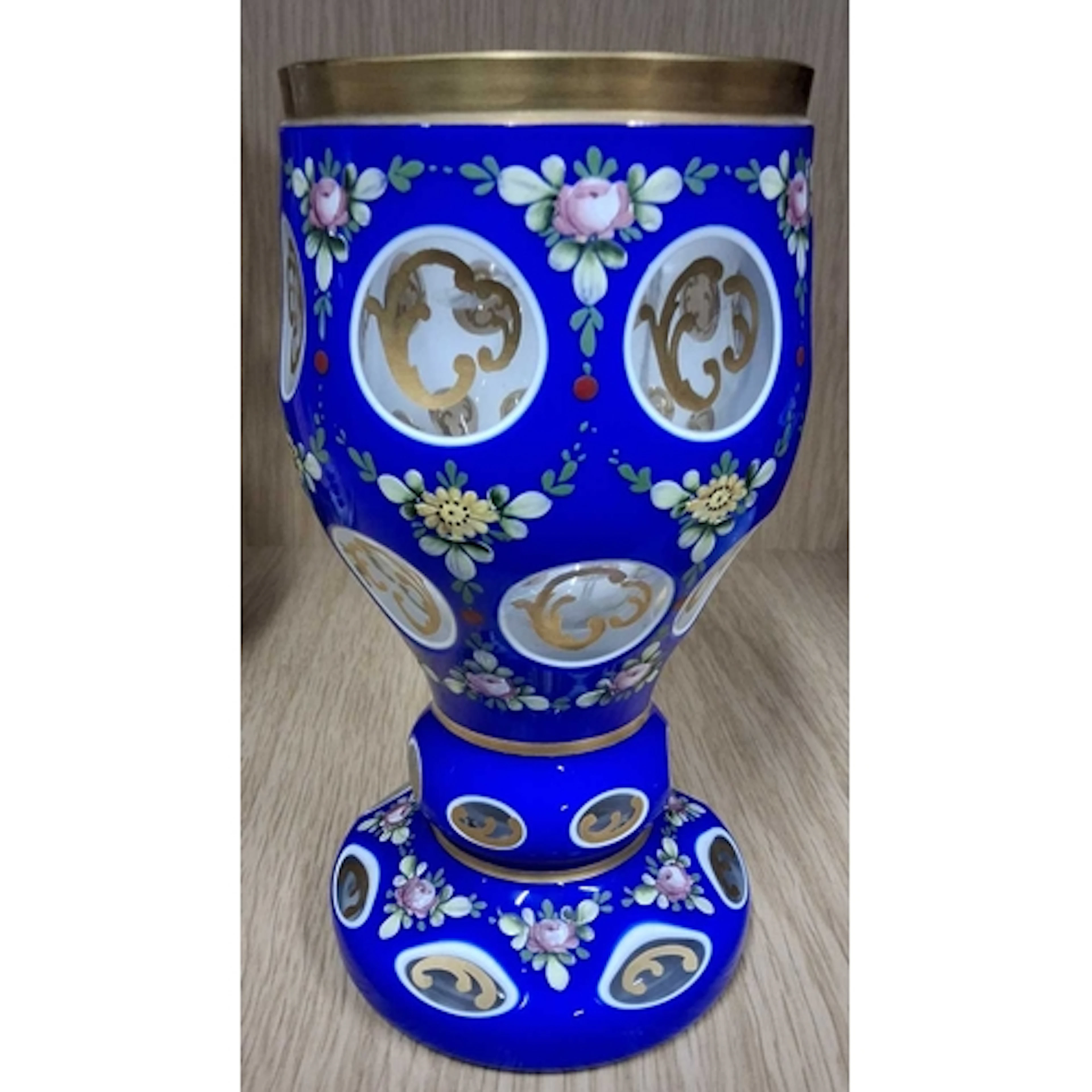 A BOHEMIAN CASED GLASS GOBLET, with royal blue and white ove...