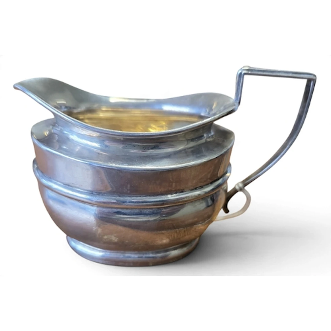 A Birmingham Silver Cream Jug by Joseph Gloster Ltd 1935, 92...