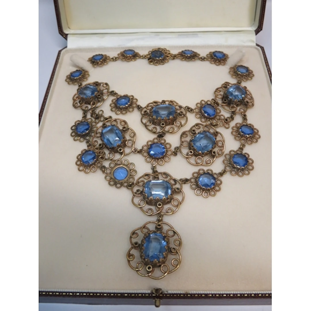 Ornate gold plated blue paste set necklace, in case
