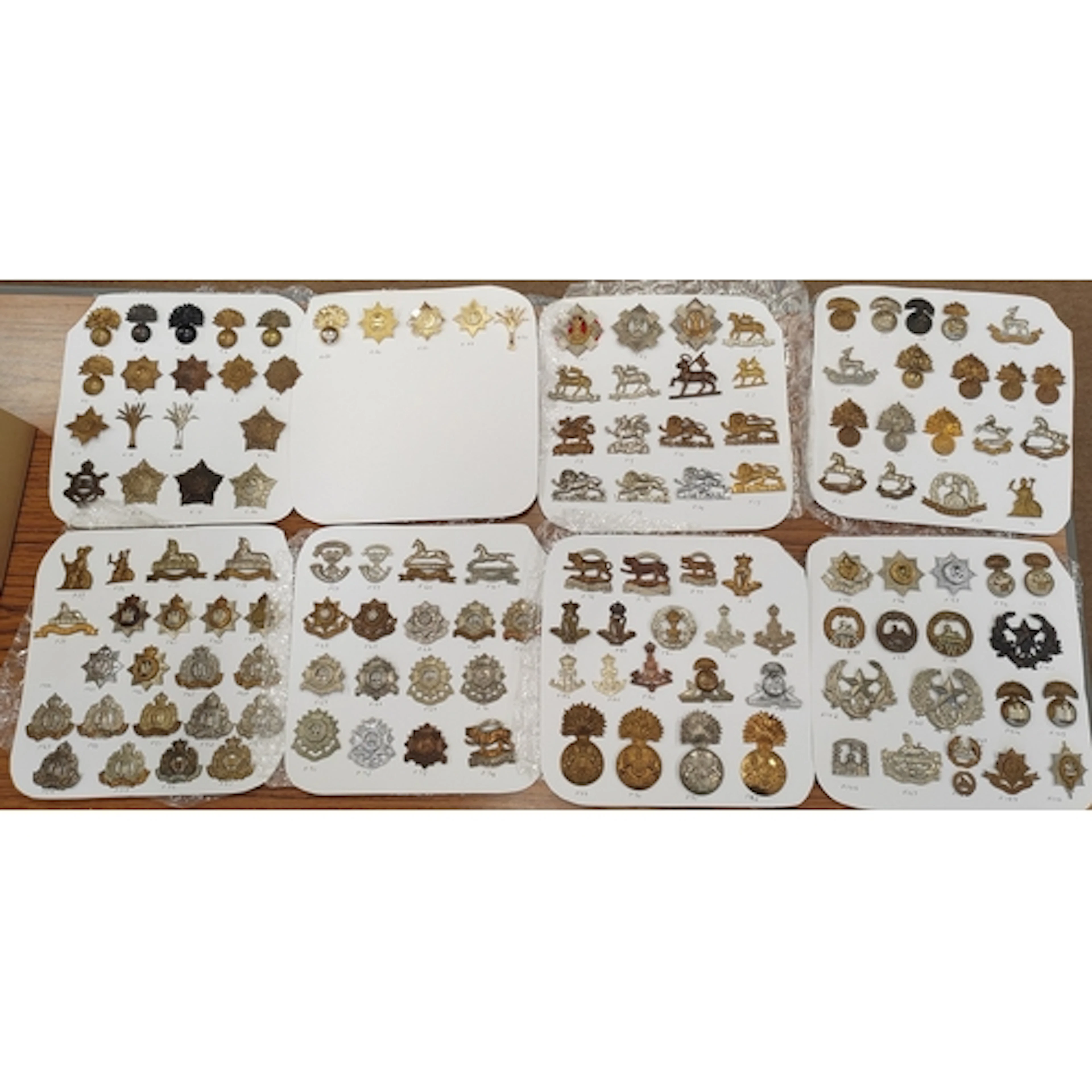Collection of cap badges from various Infantry regiments and...