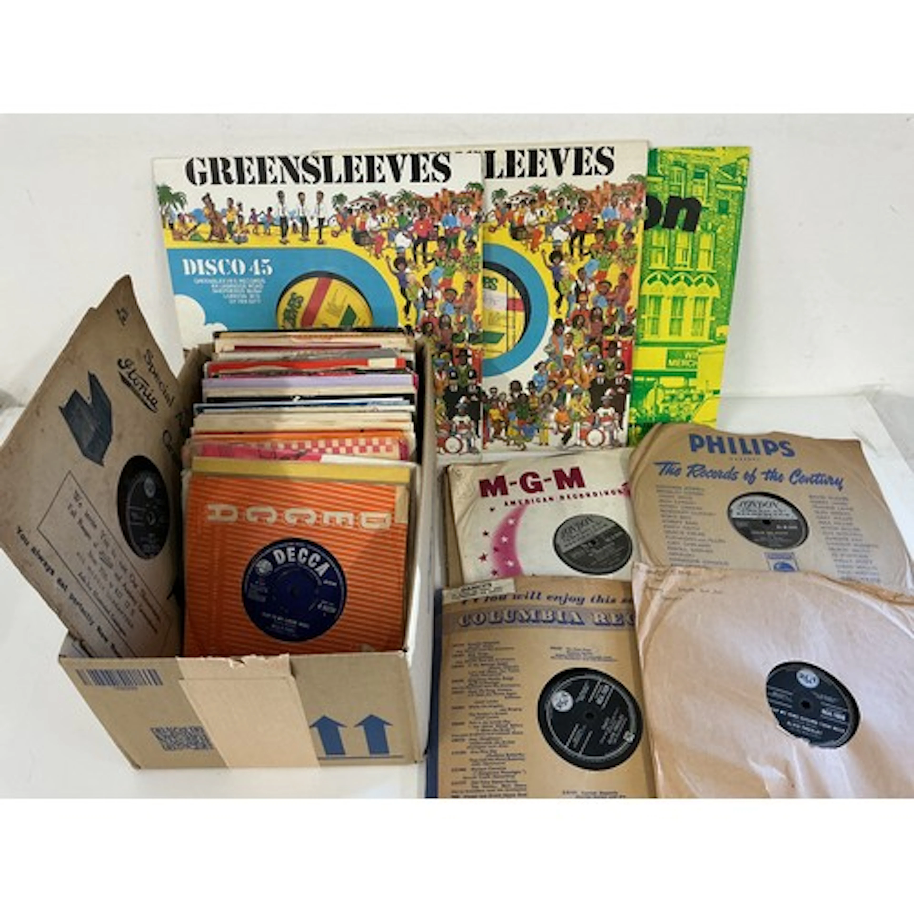 A collection of 7” singles, 78s and CDs by various artists i...