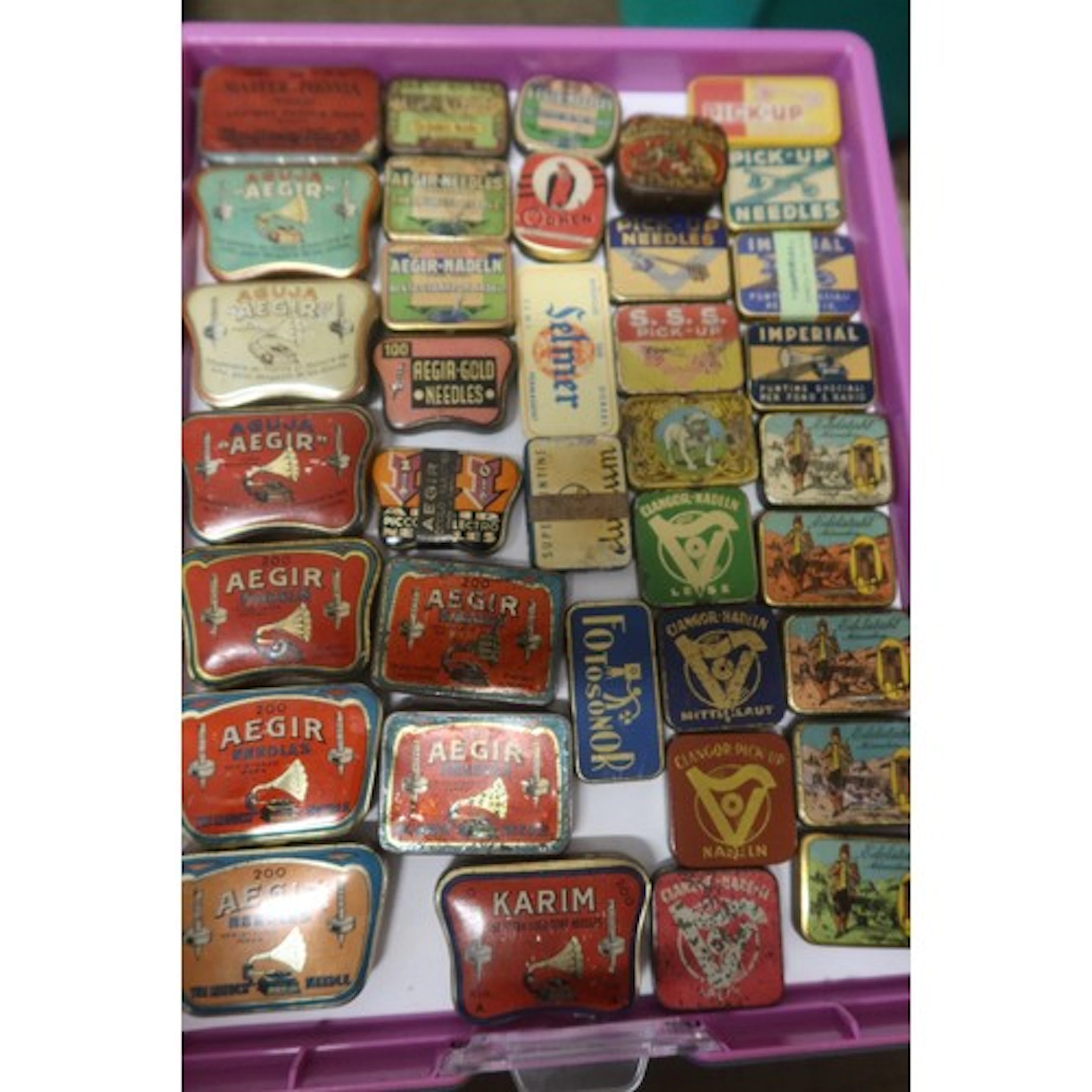 A tray of vintage gramophone needle tins