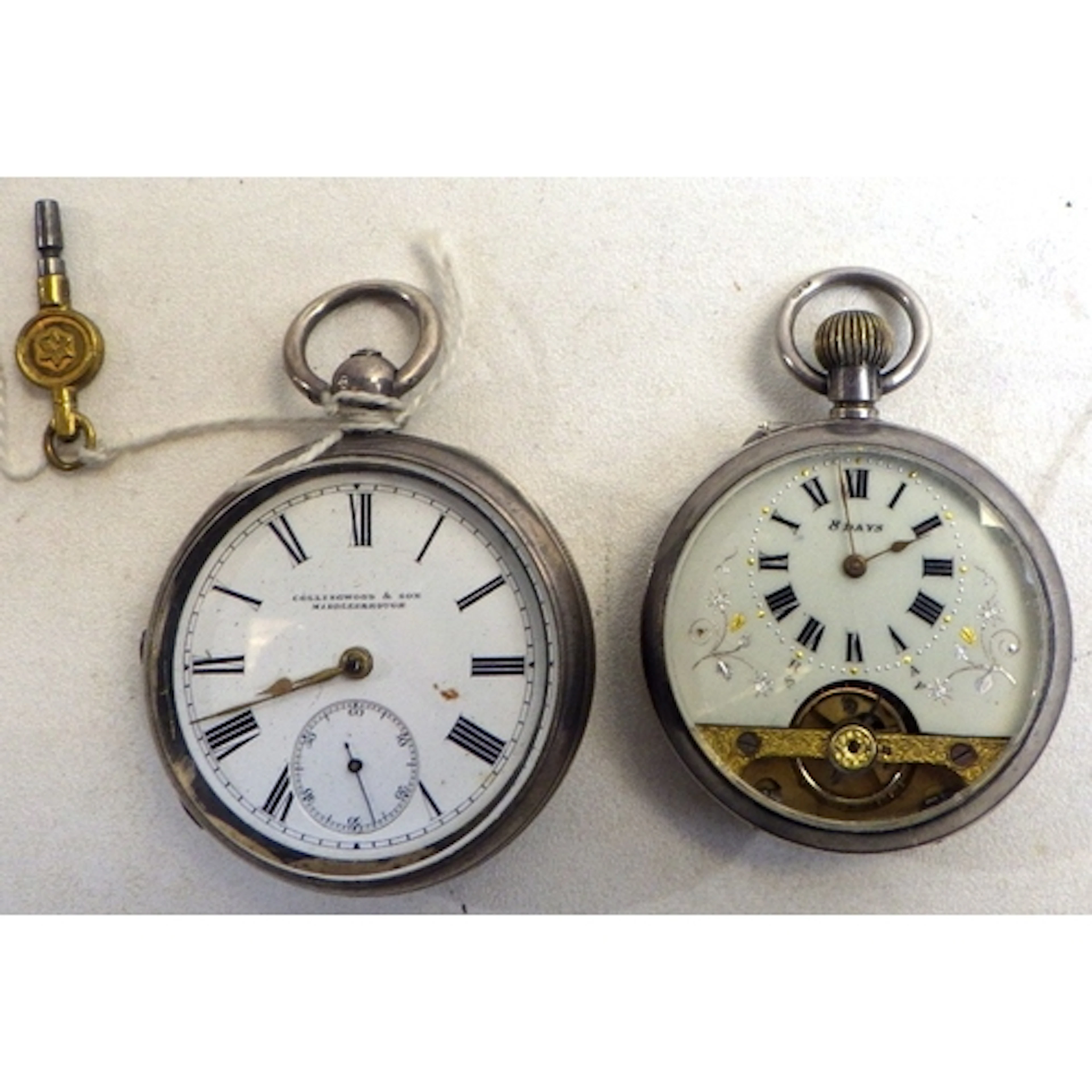 A silver cased pocket watch having a keyword lever movement,...