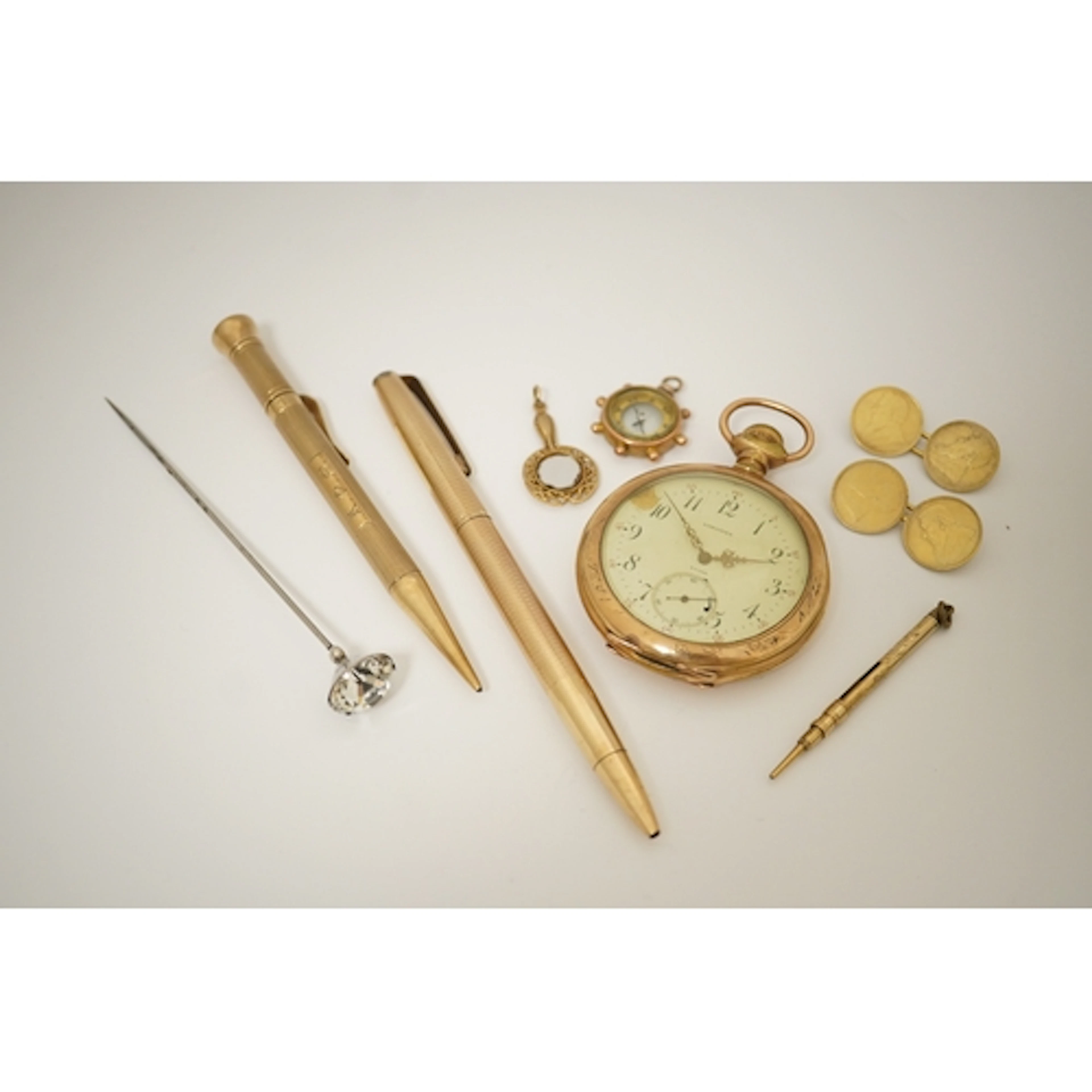 A collection of accessories, including a 9ct gold 'Everpoint...