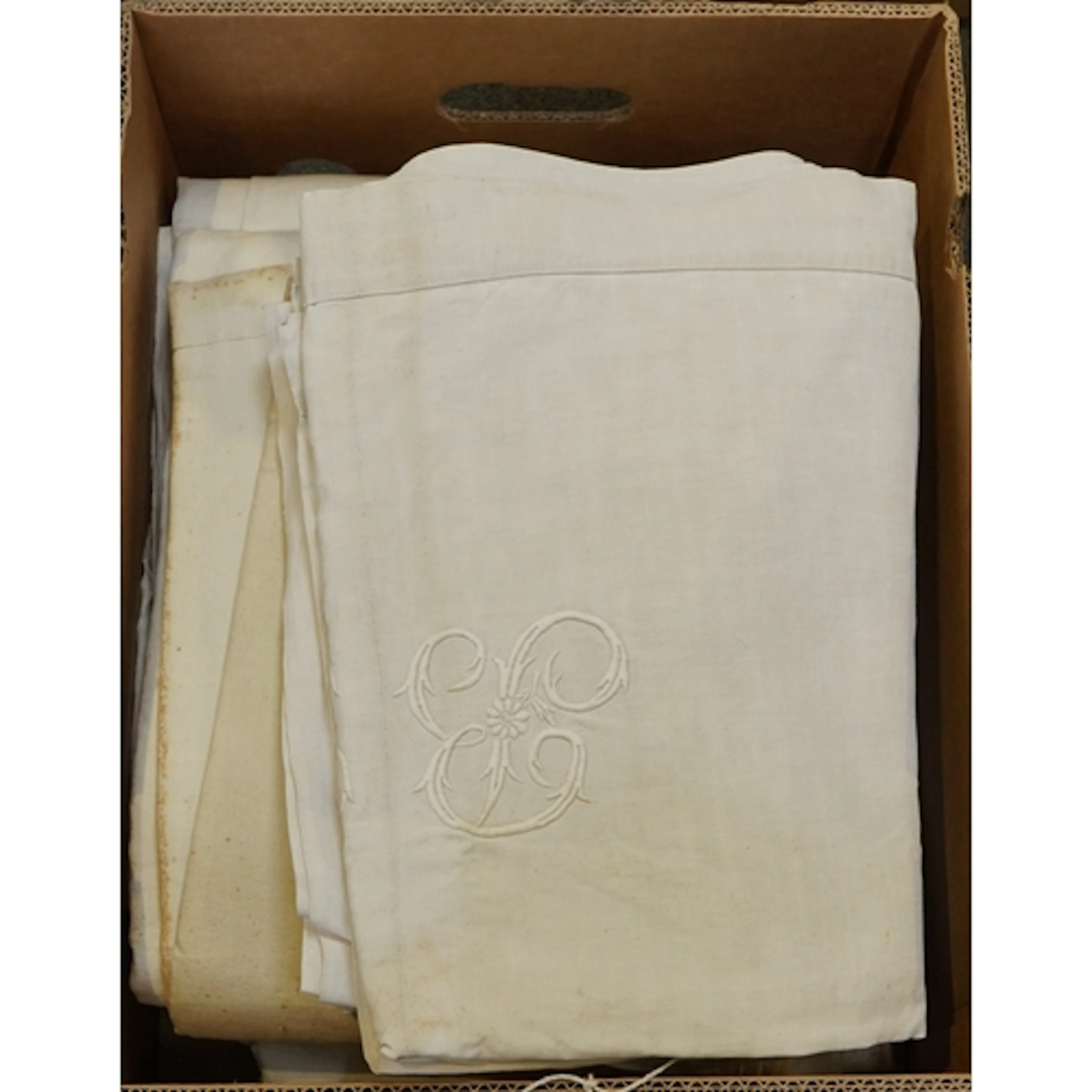 Seven monogrammed French provincial sheets