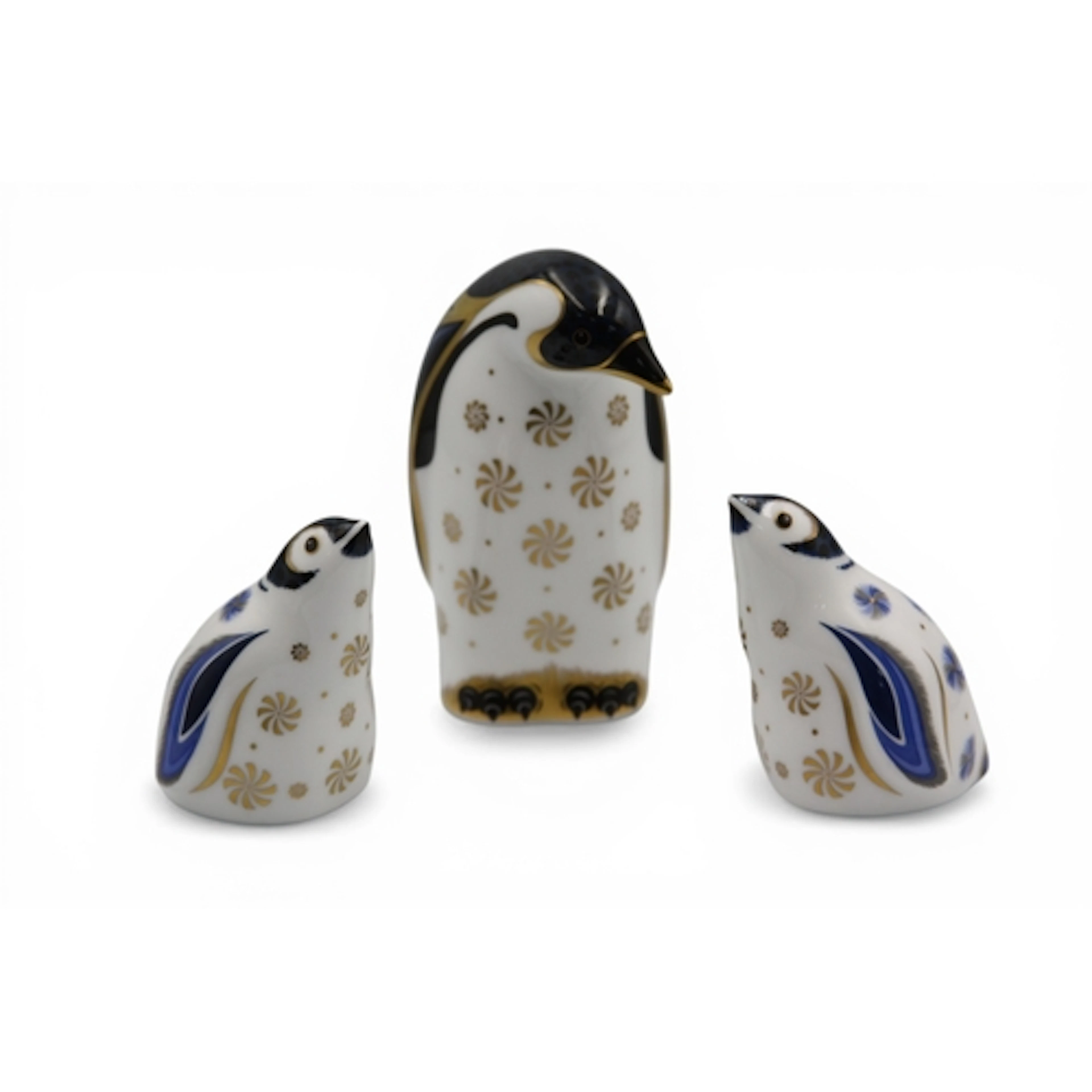 Three Royal Crown Derby Porcelain Paperweights of 'Penguins'...