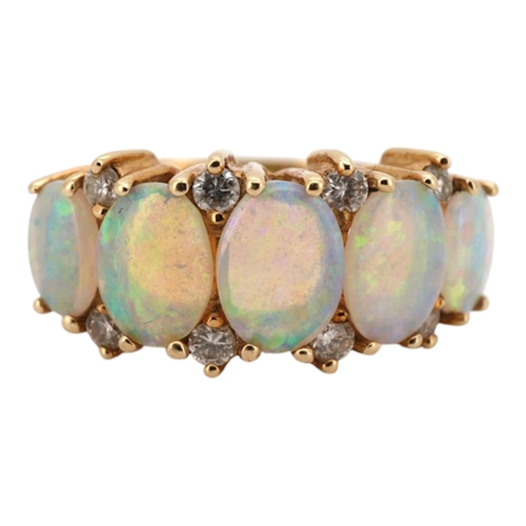 An opal and diamond ring, set with five graduated cabochon o...