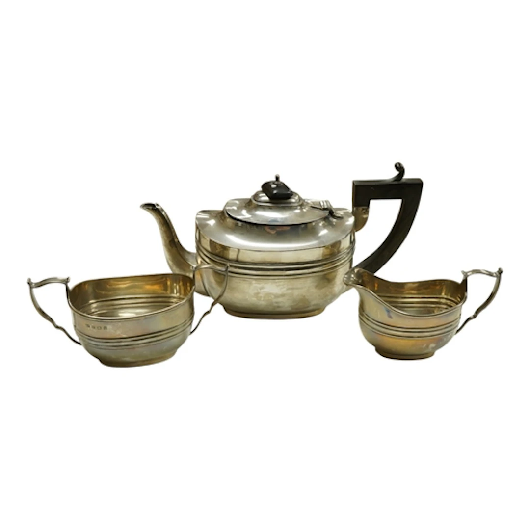 A George V silver three piece tea service Birmingham, 1913, ...