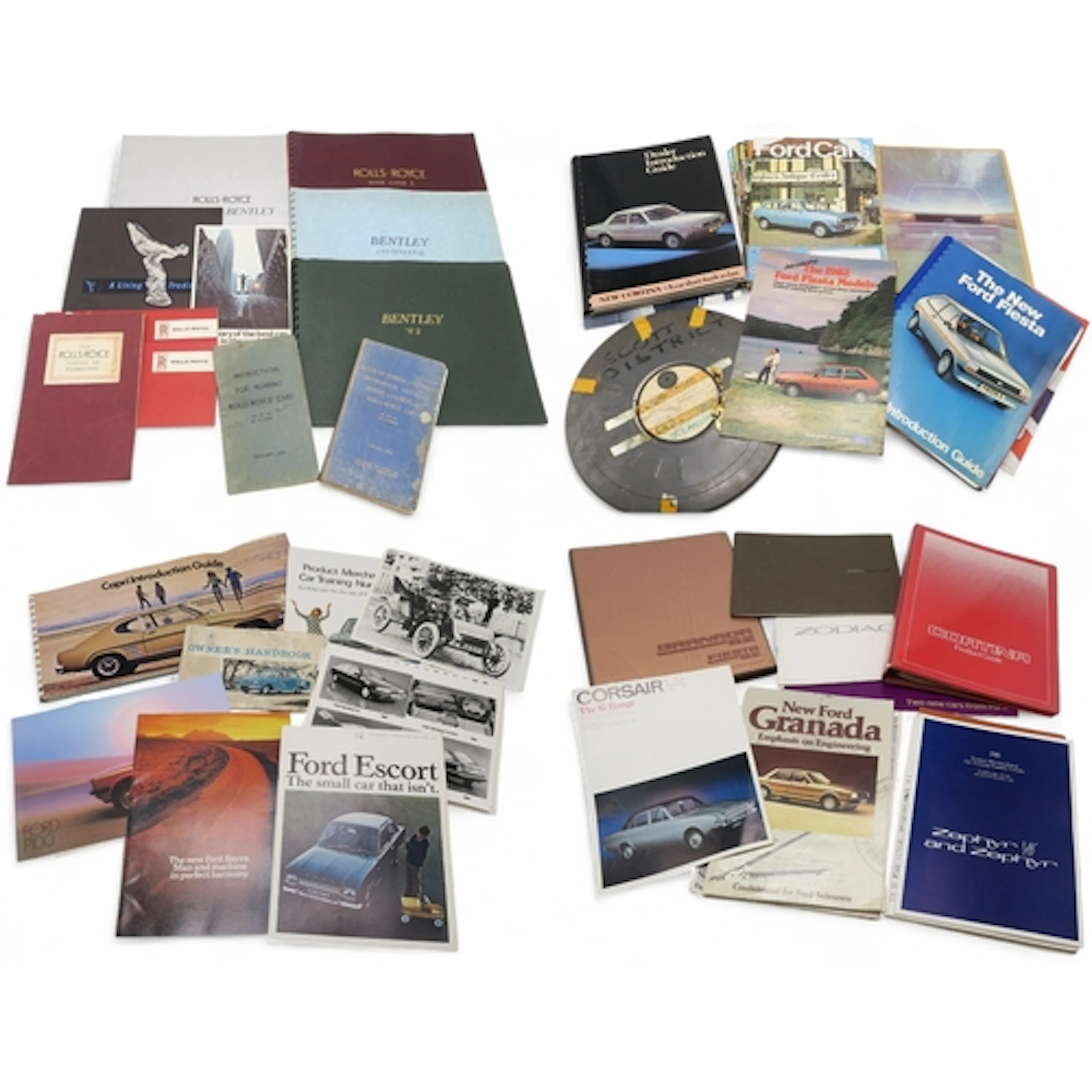 A collection of vintage Ford car brochures, dealer's product...