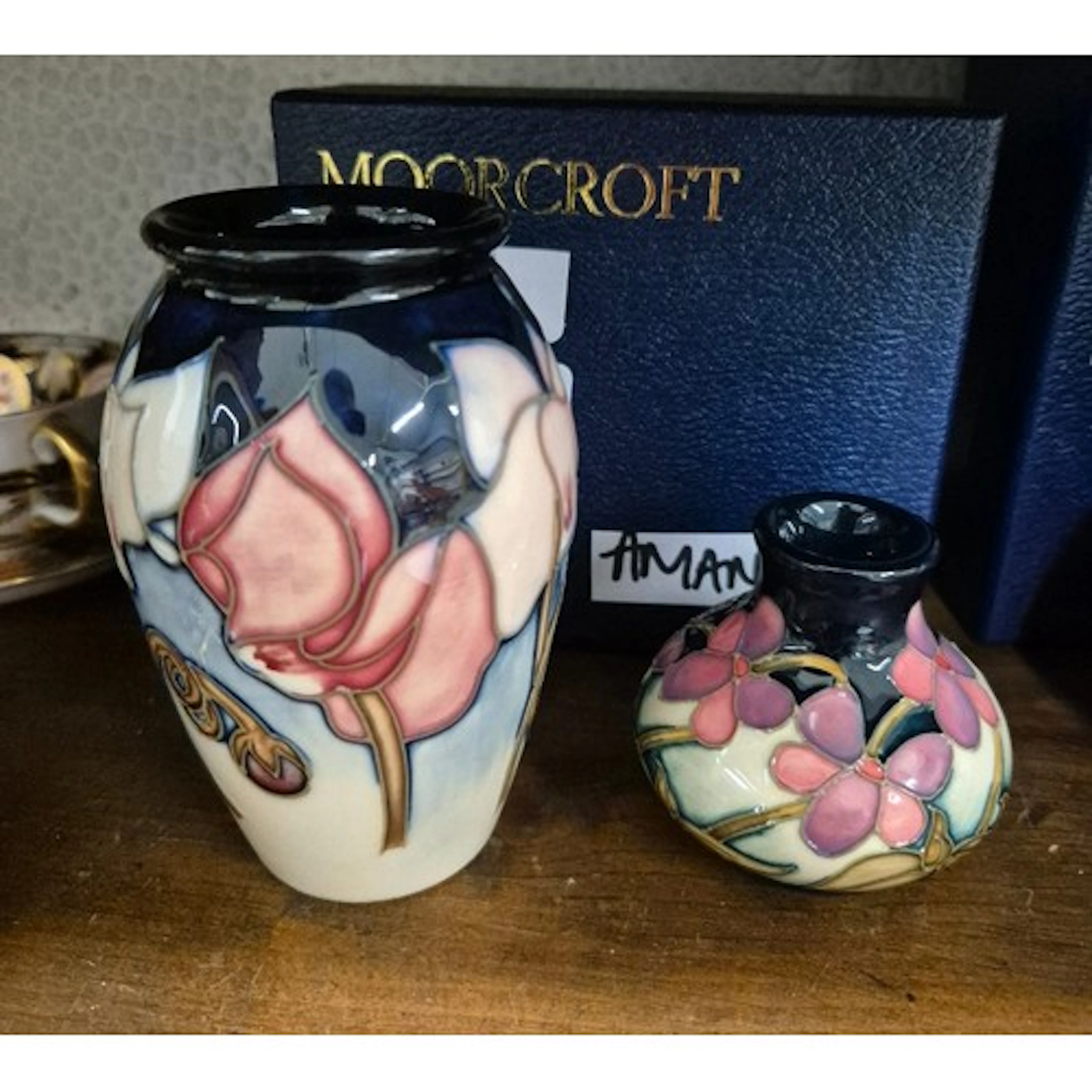 2 Moorcroft pottery vases. Miniature squat vase, Rossette, s...