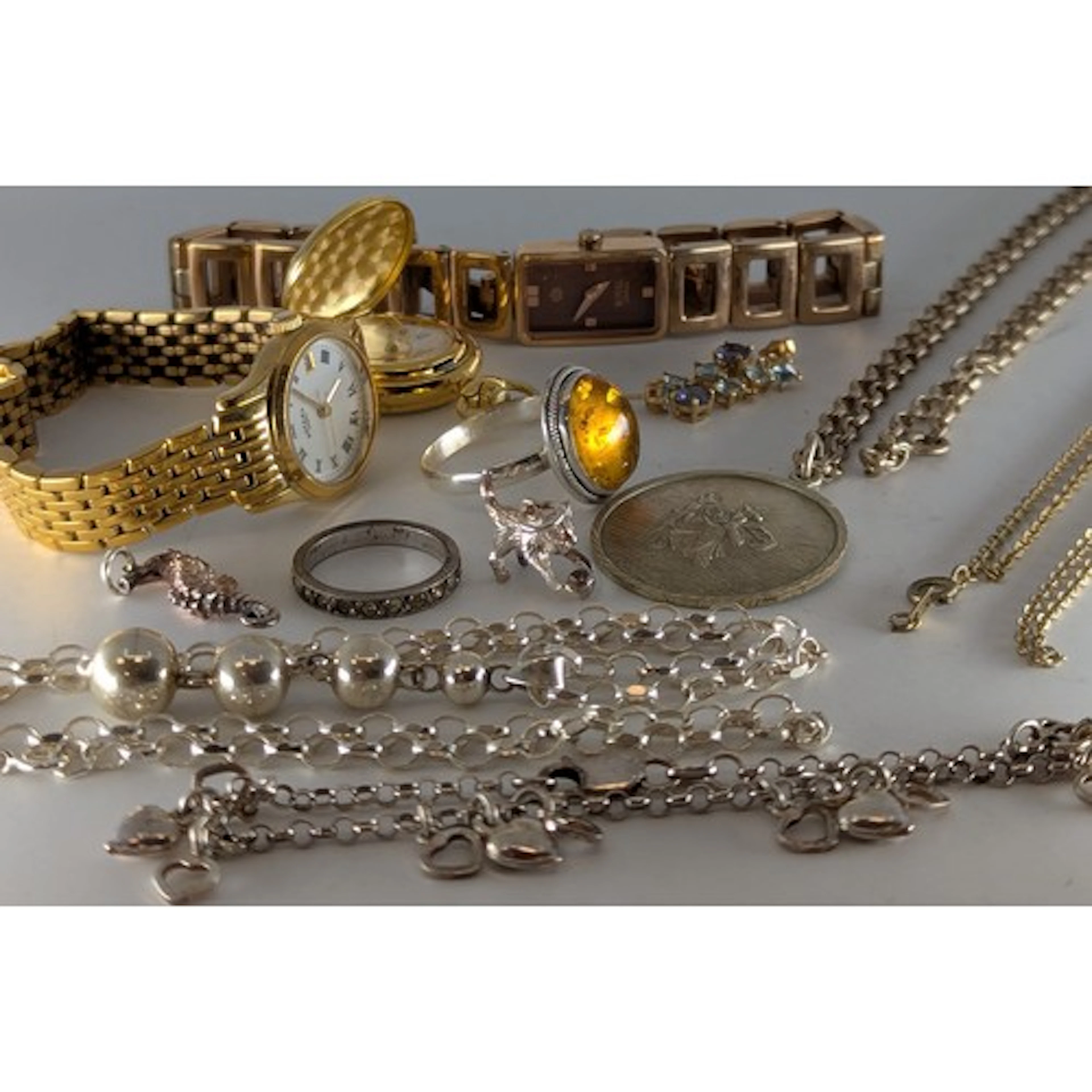 A quantity of costume jewellery including a silver circular ...