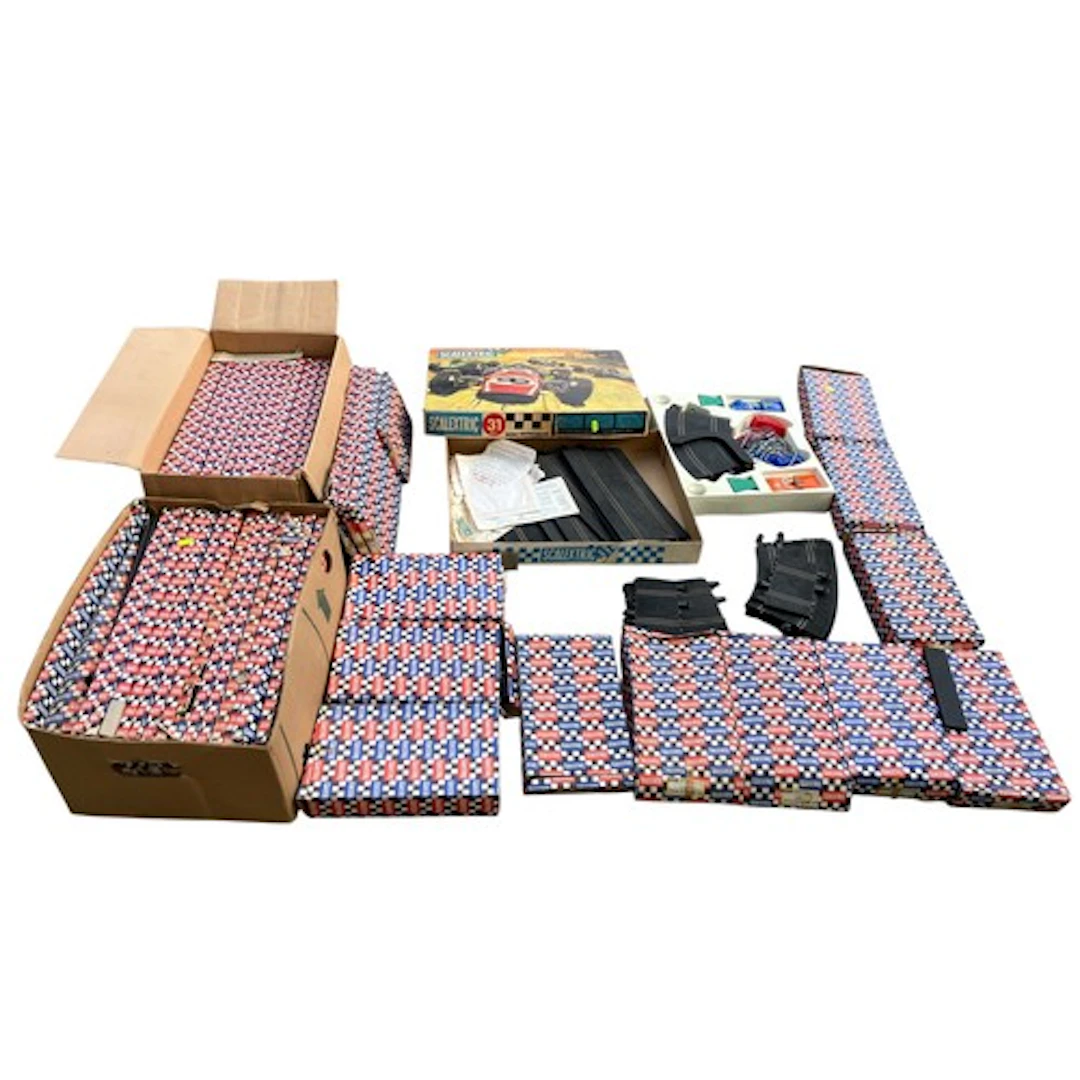 Large quantity of Scalextric’s including boxes of track &amp...