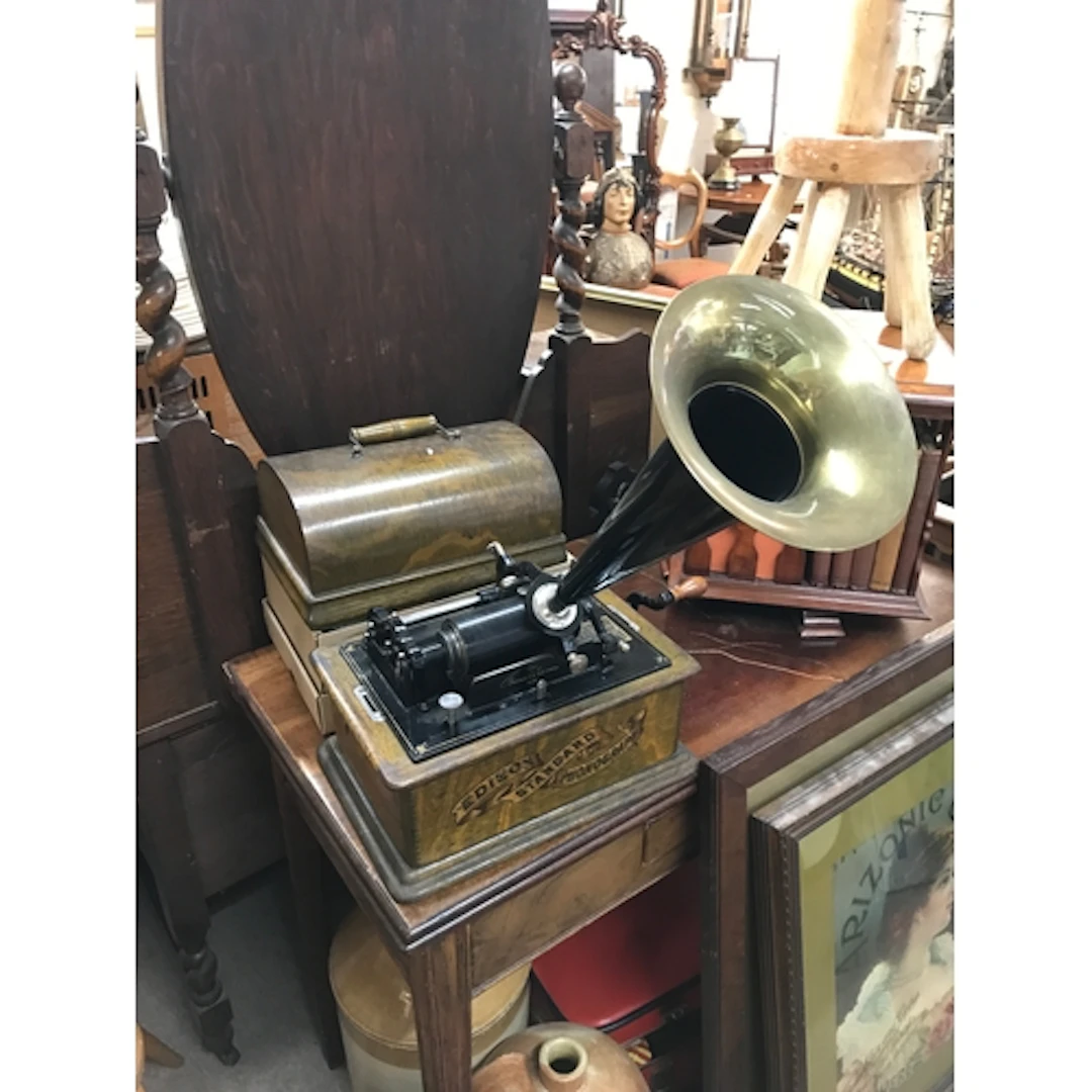 An Edison standard phonograph in oak case with horn and 11 c...