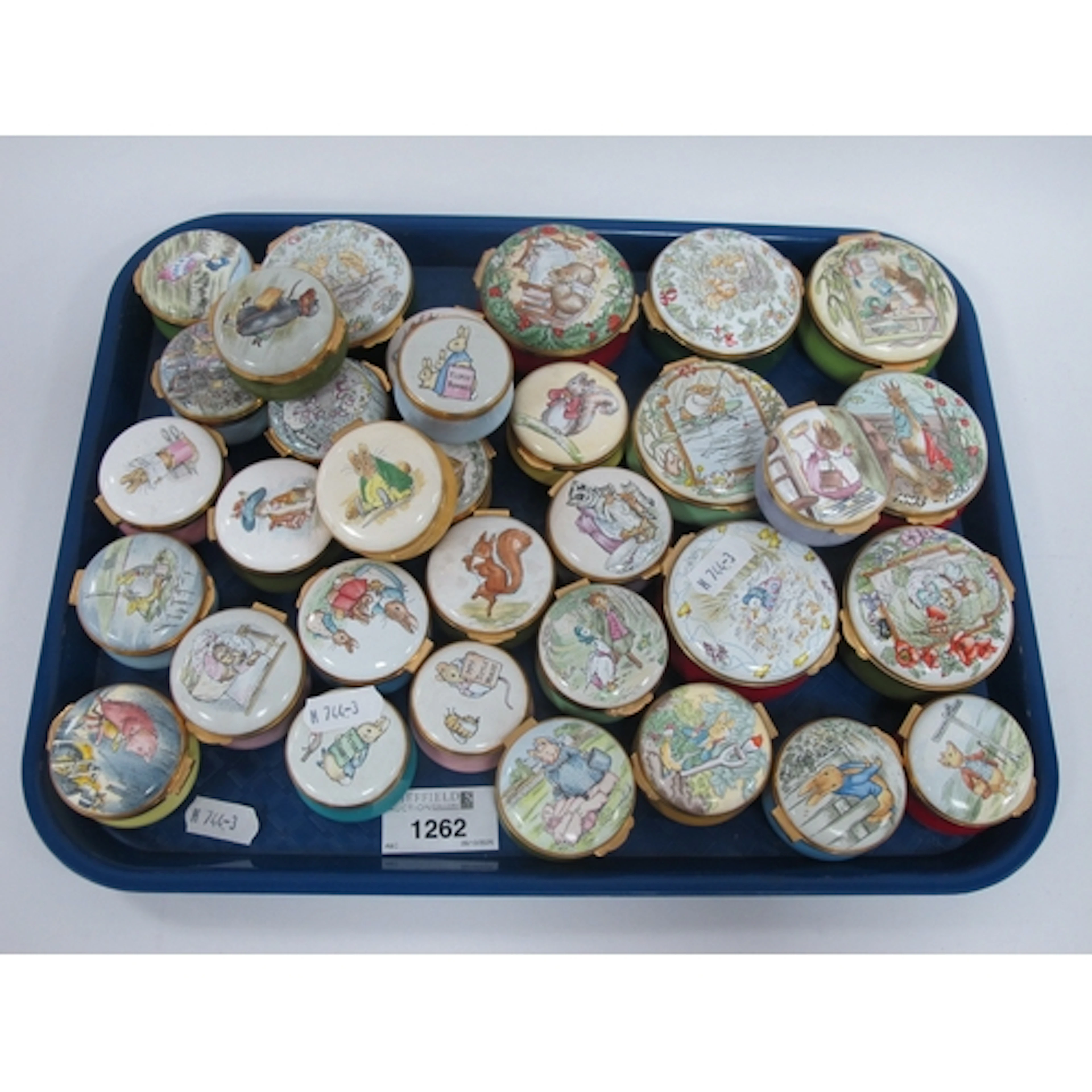 Thirty-three Crummles & Co "Beatrix Potter" enamel and porce...
