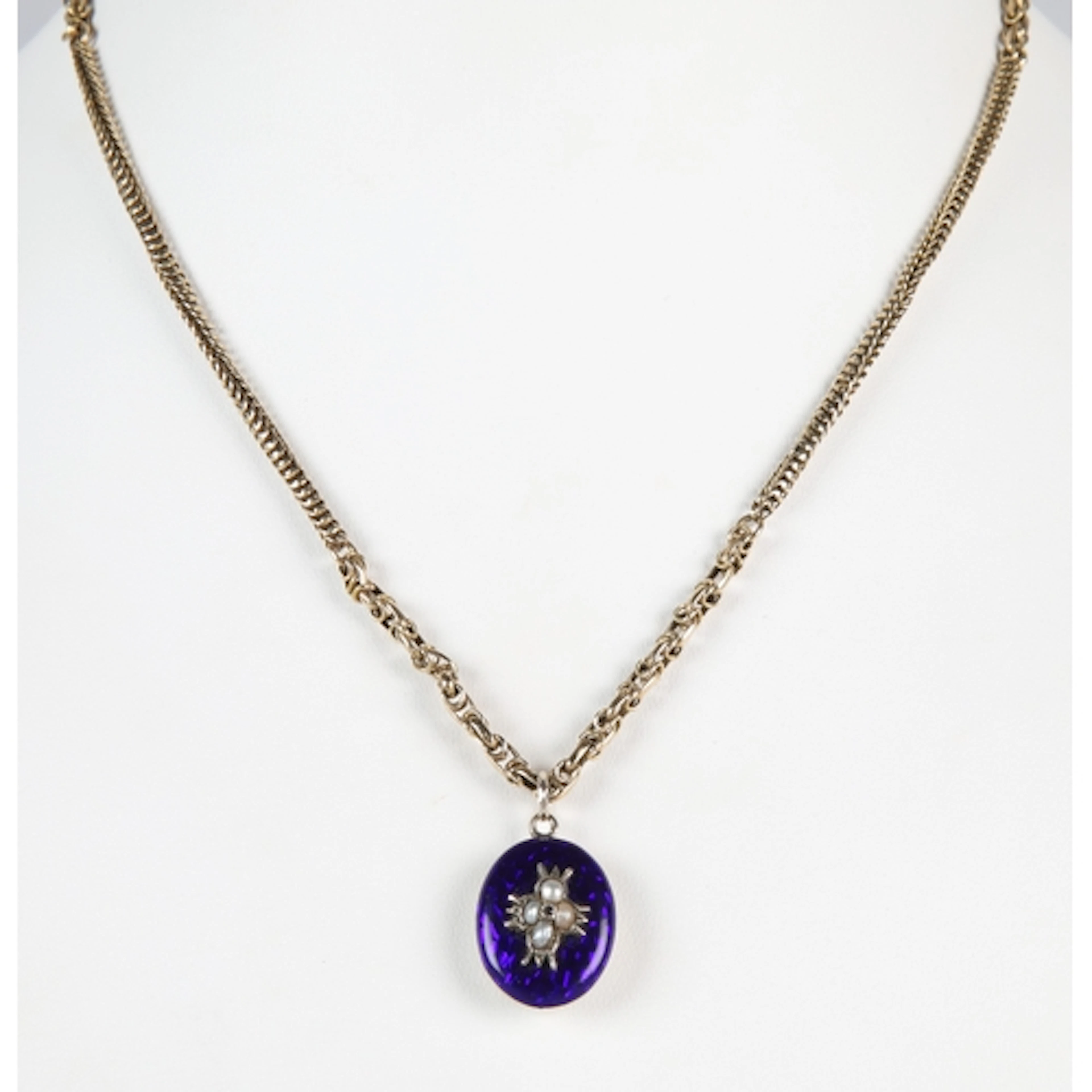 Blue guilloche enamel and pearl set mourning pendant, the go...