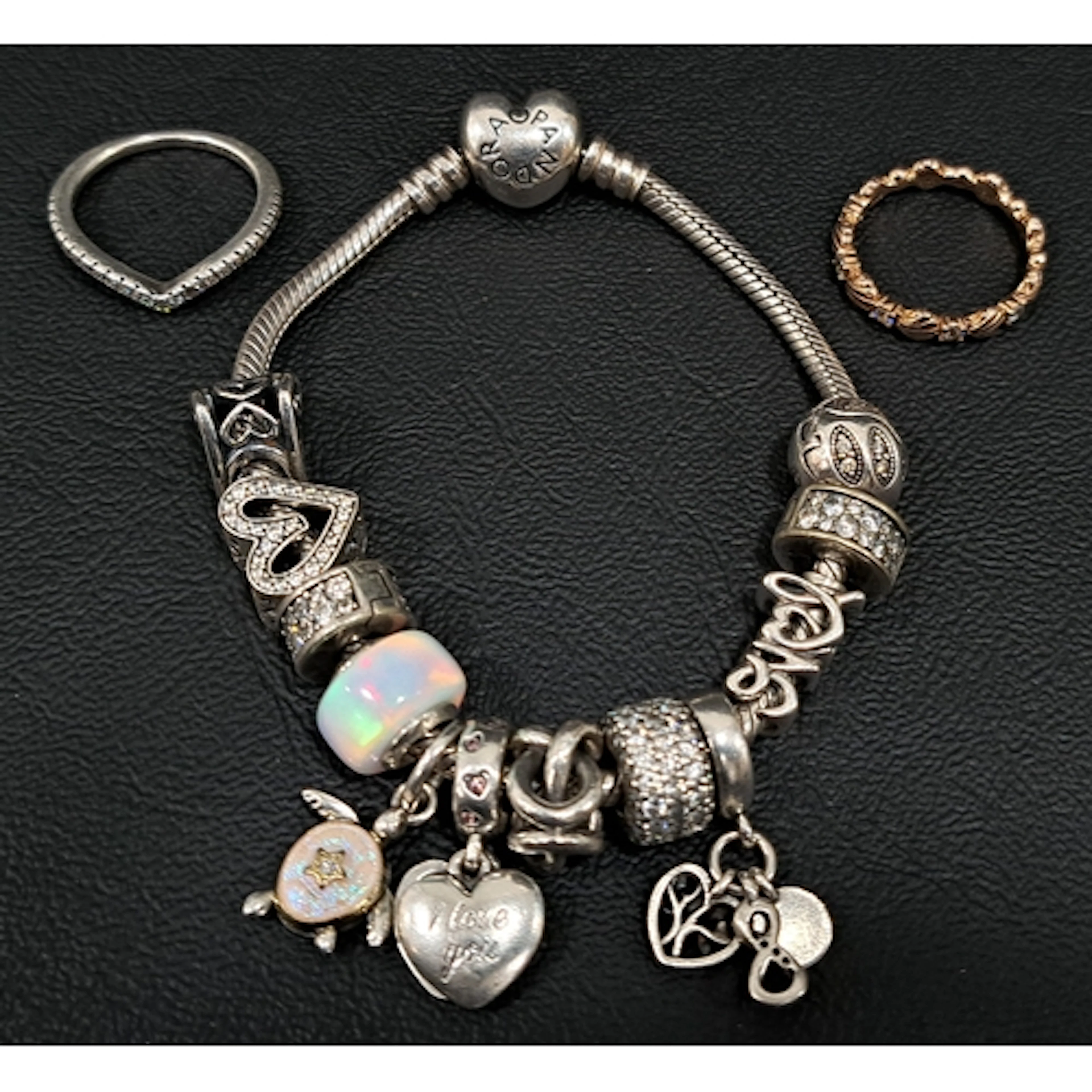 SELECTION OF PANDORA JEWELLERY comprising a Moments silver c...