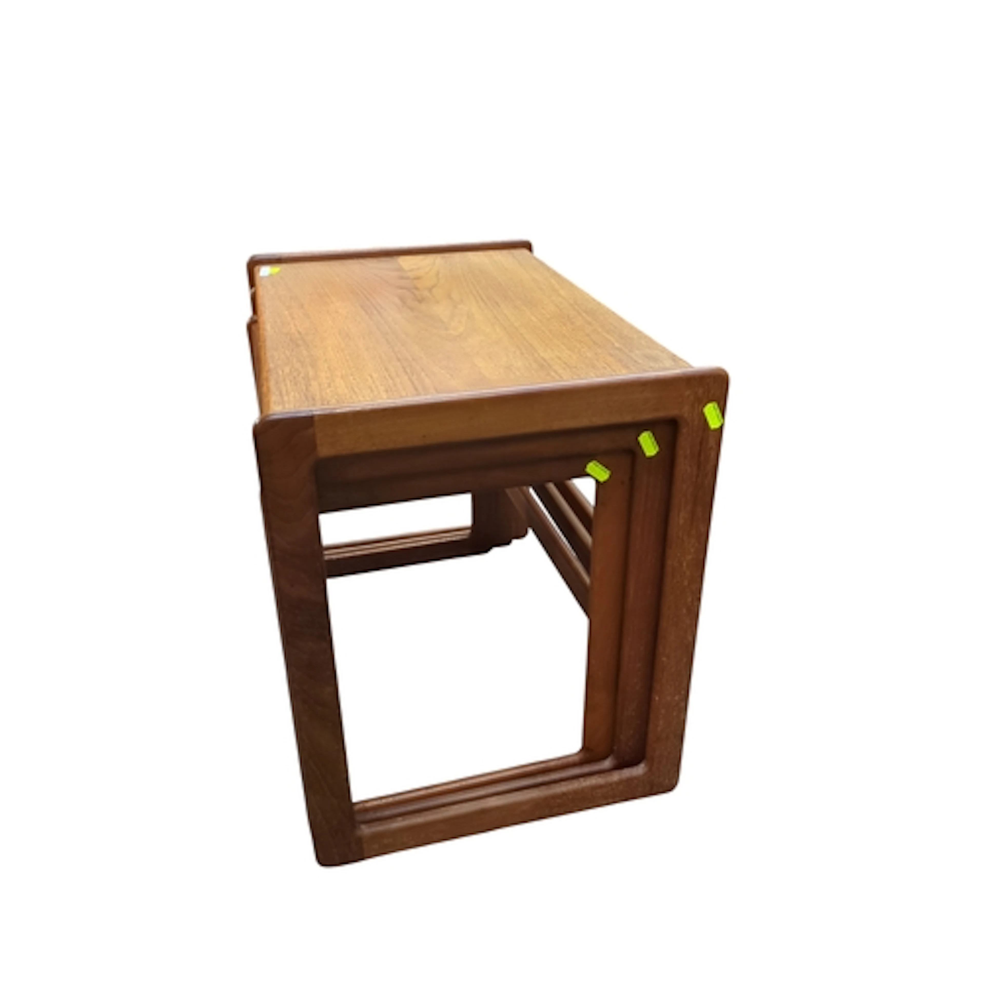 Mid-century teak nest of three tables, with rectangular tops...