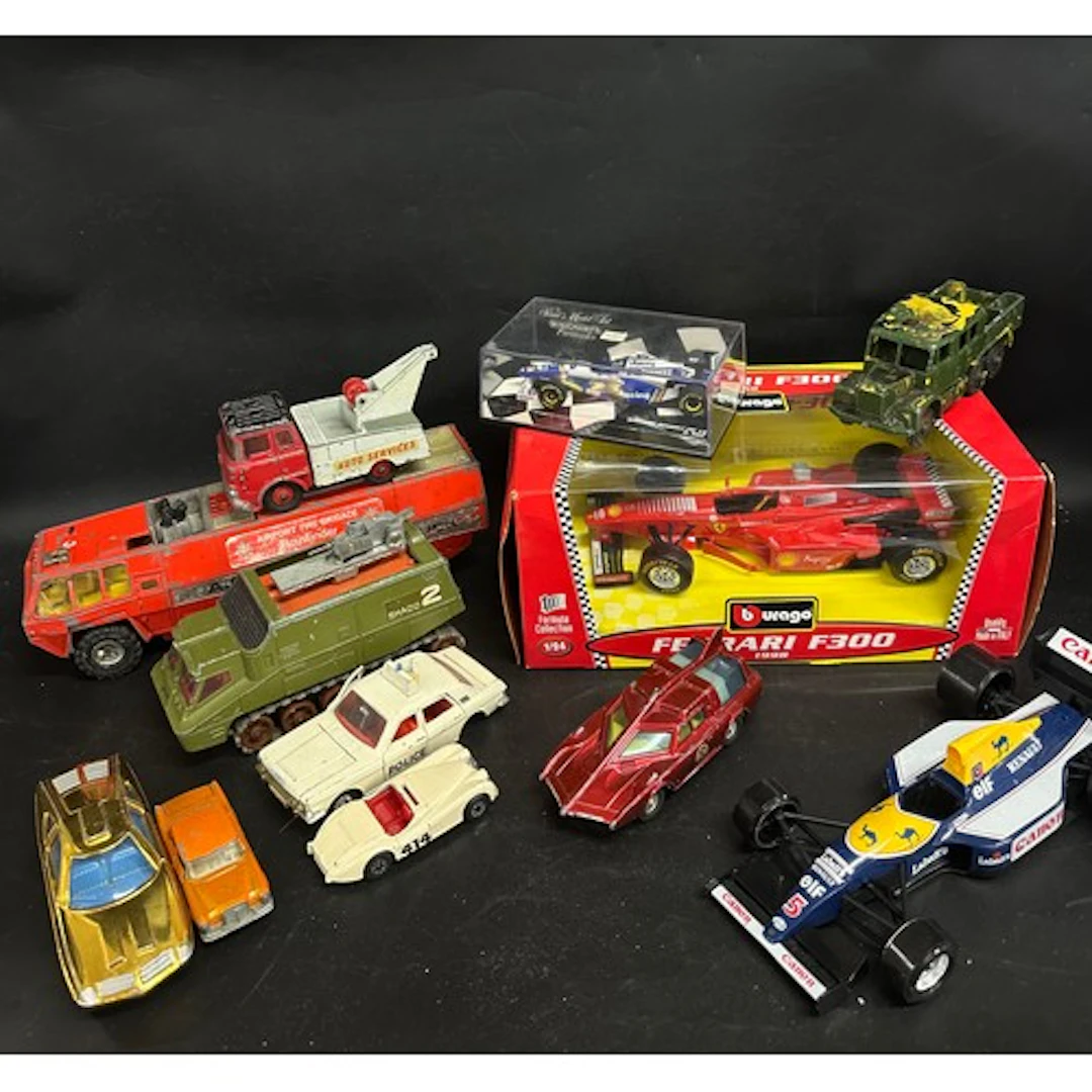A collection of die-cast vehicles to include Dinky, boxed Bu...