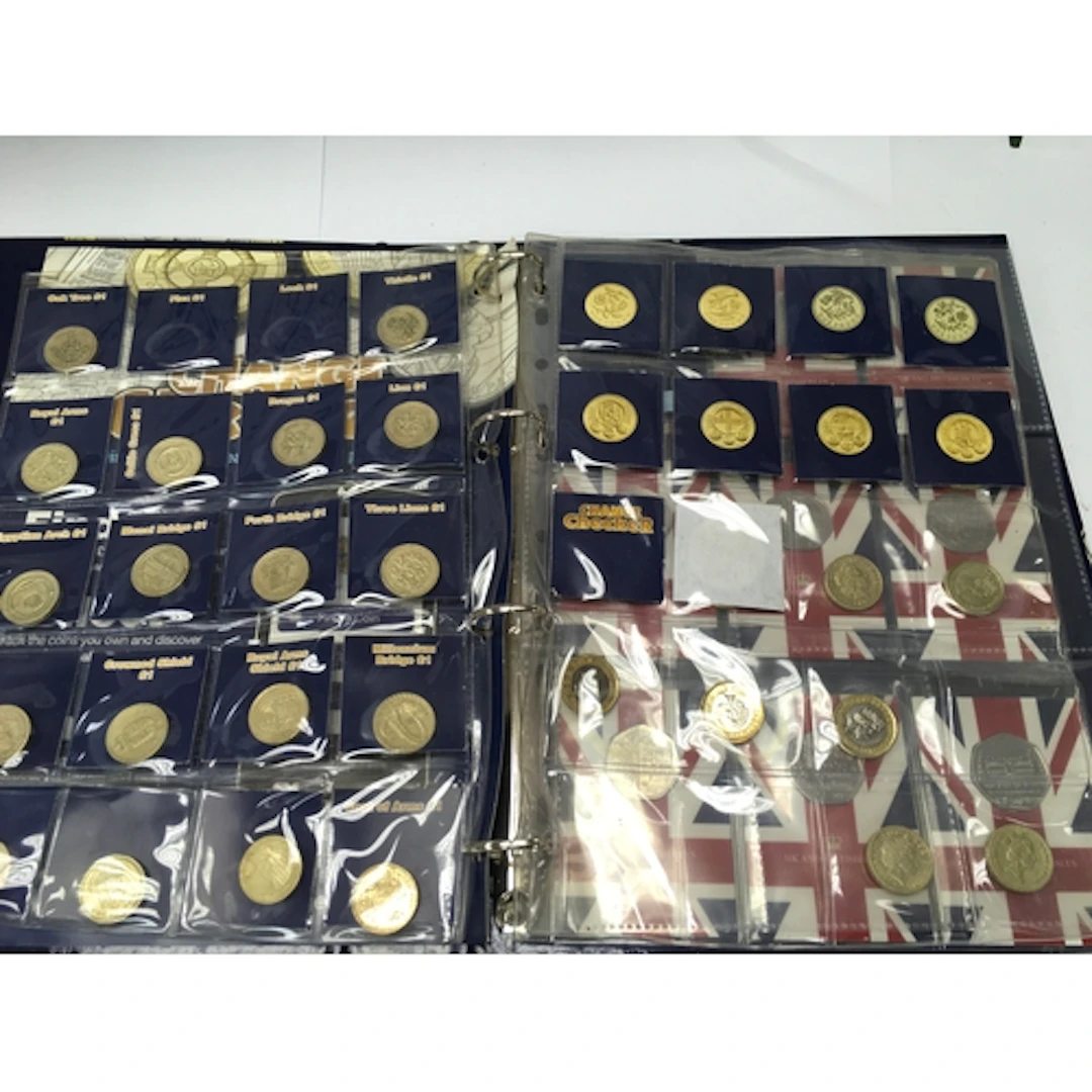 A coin checker album cointaining various £1 coins and ...