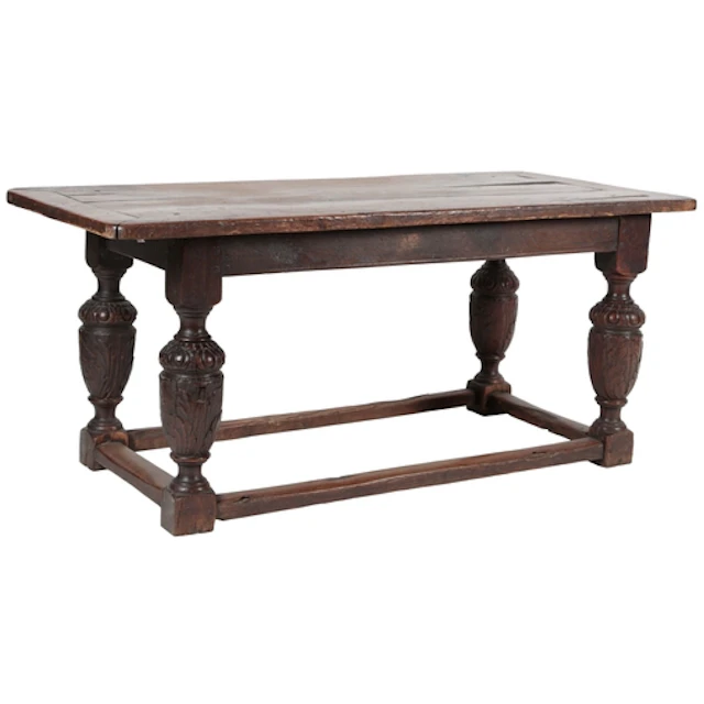 An oak refectory table, 18th century and later, the cleated ...