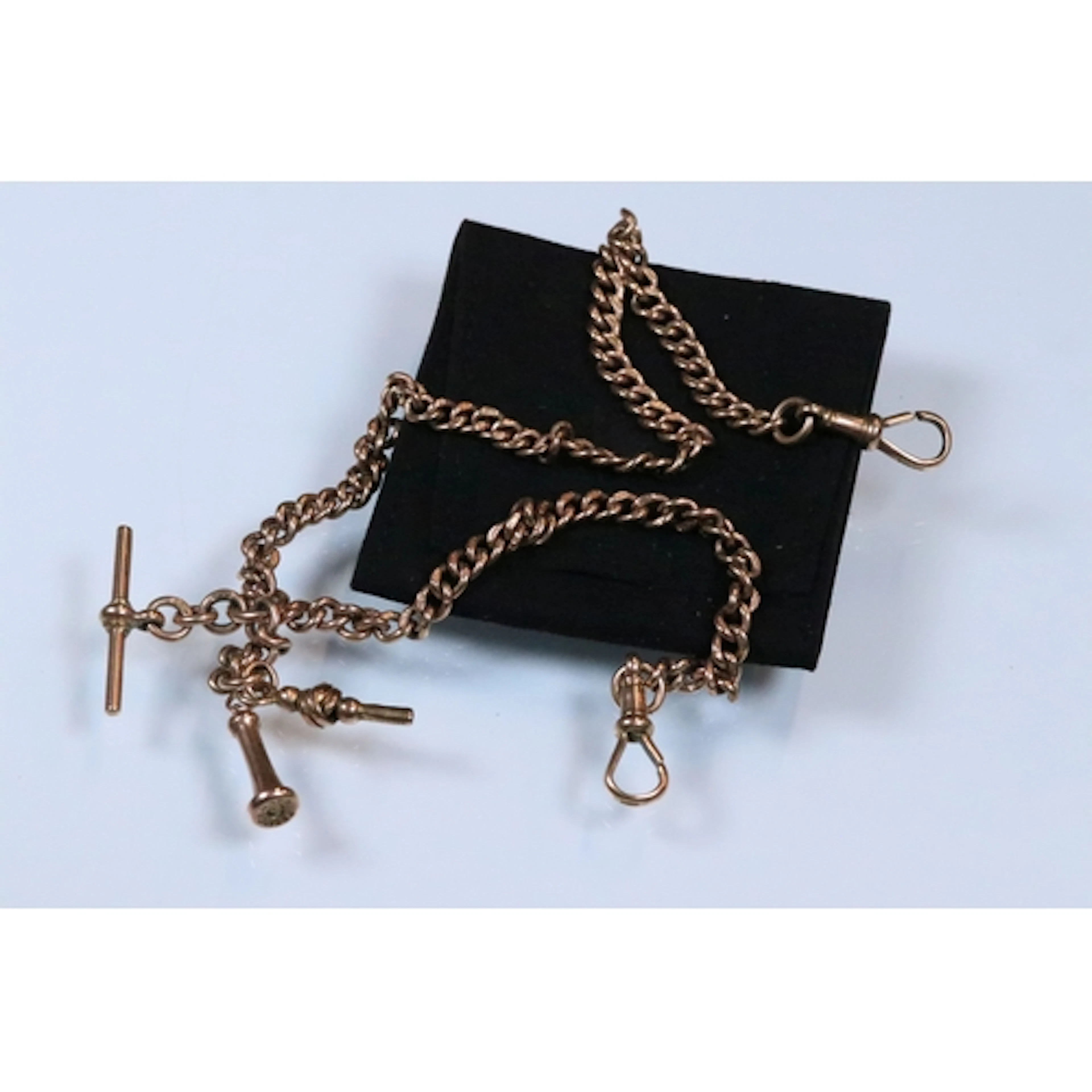 9ct gold curb link watch chain having two dog lead clasps, T...