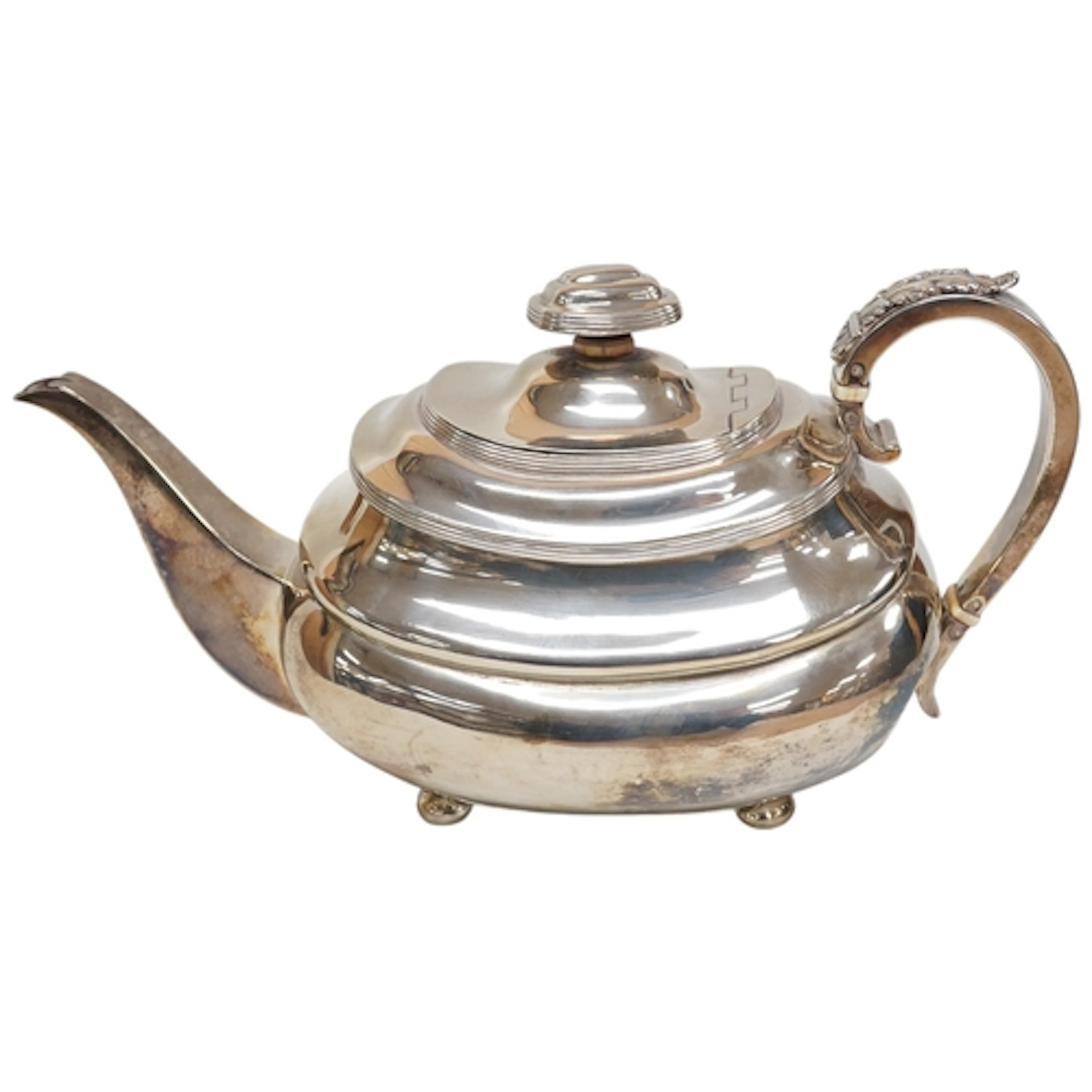 A George IV silver teapot by Thomas & George Hayter, of oval...