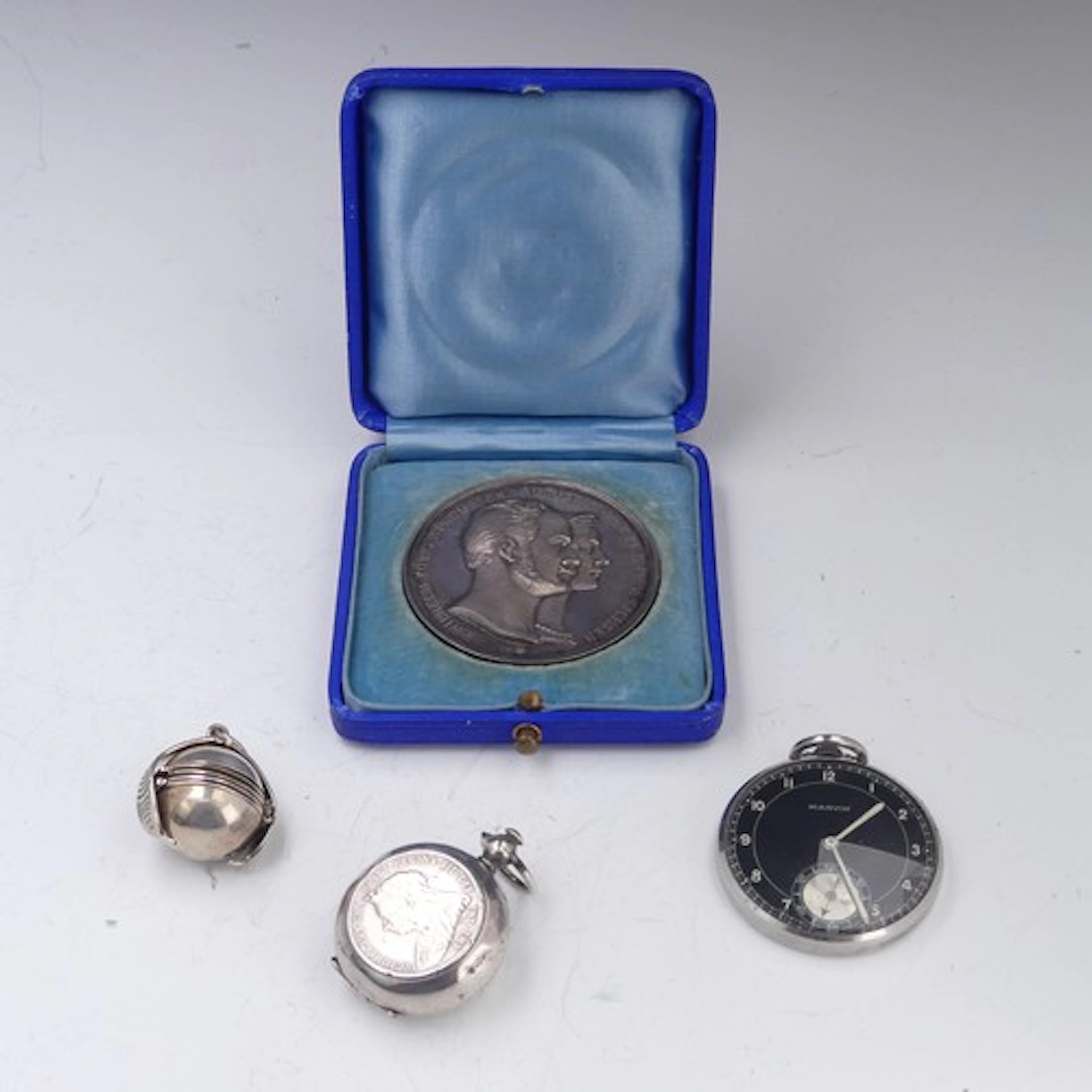 A cased German Wilhelm and Augusta Silver Anniversary Medal,...