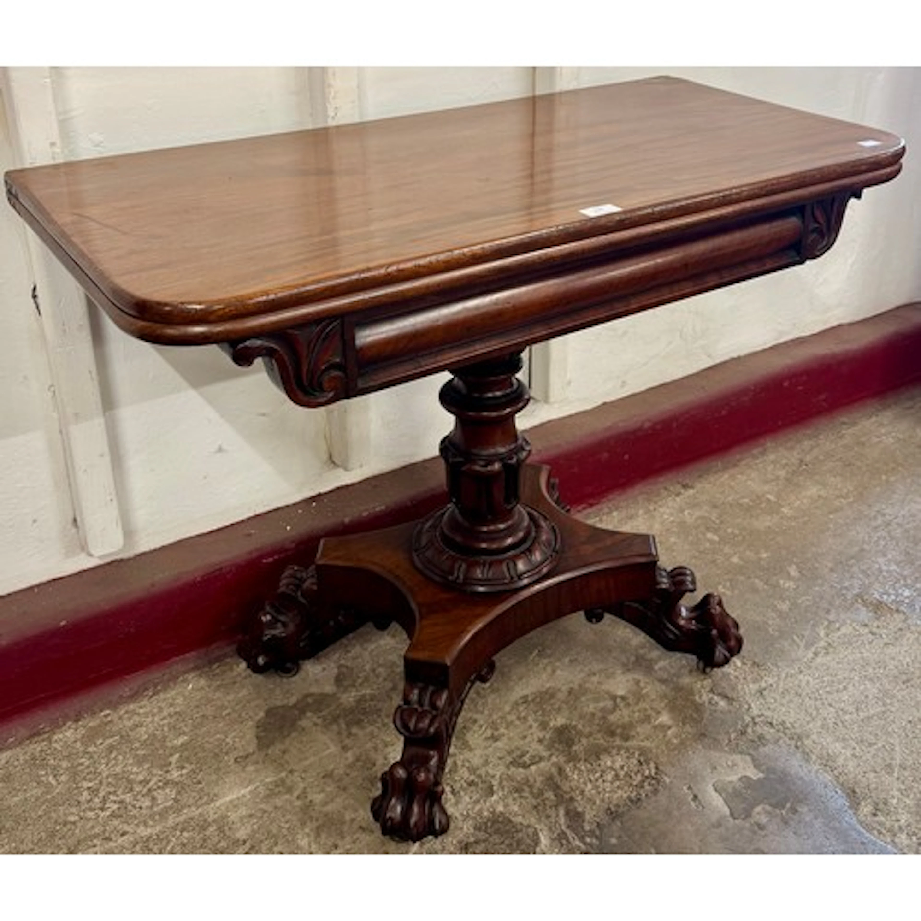 A George IV mahogany D-shaped fold-over tea table